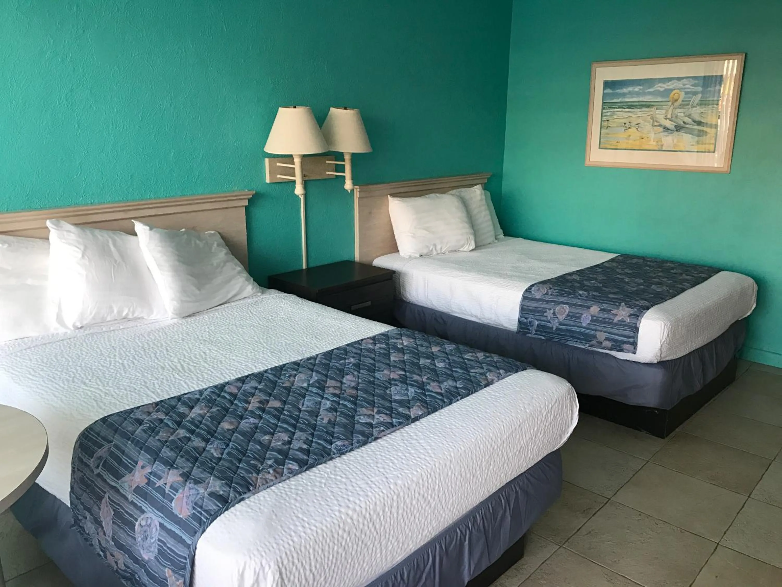 Bed in Tangiers Resort Motel