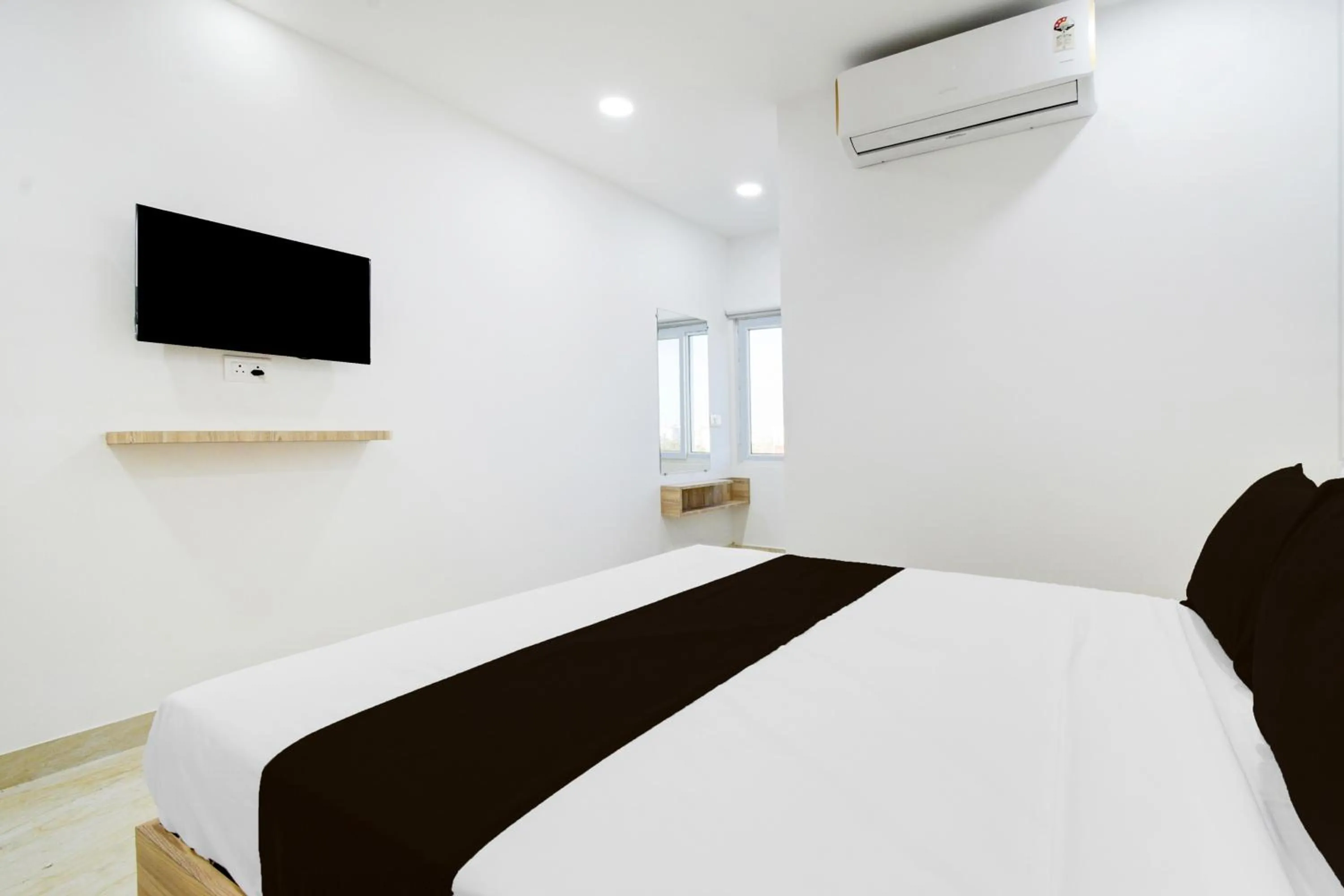 Bedroom, Bed in Super Townhouse LB Nagar Metro Station