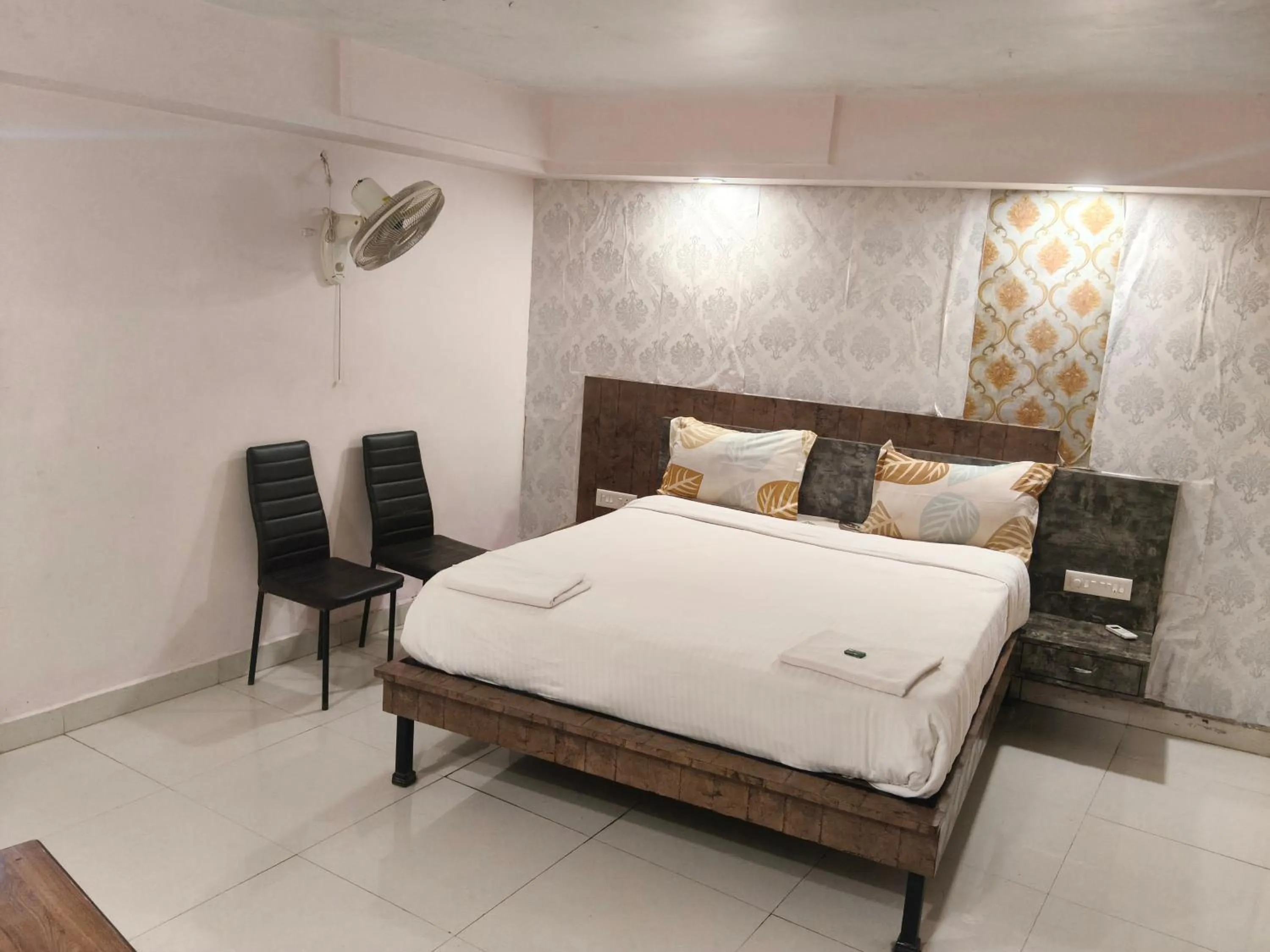 Bed in Hotel Laxmi Residency