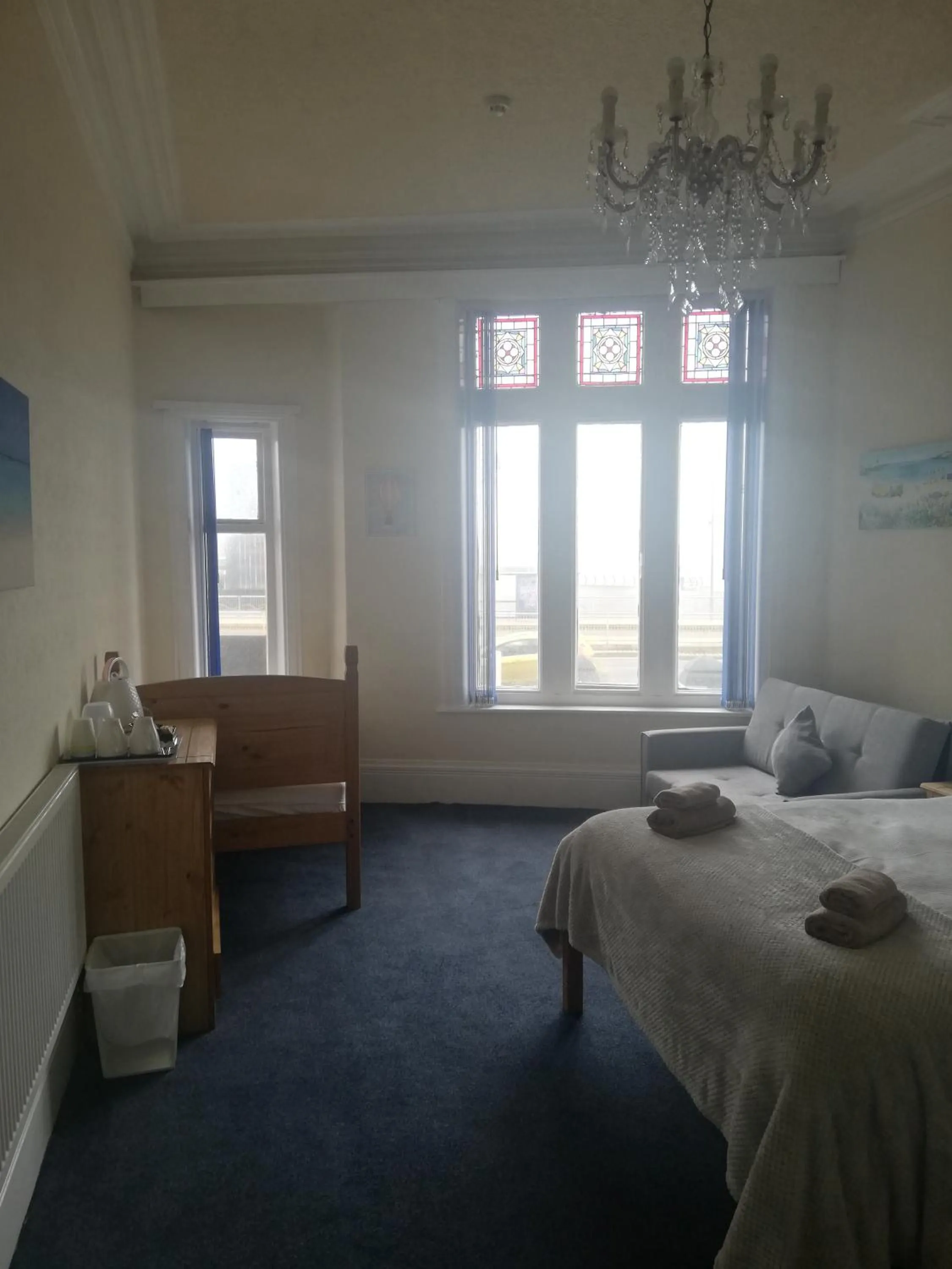 Bed in Camelot Seafront Hotel