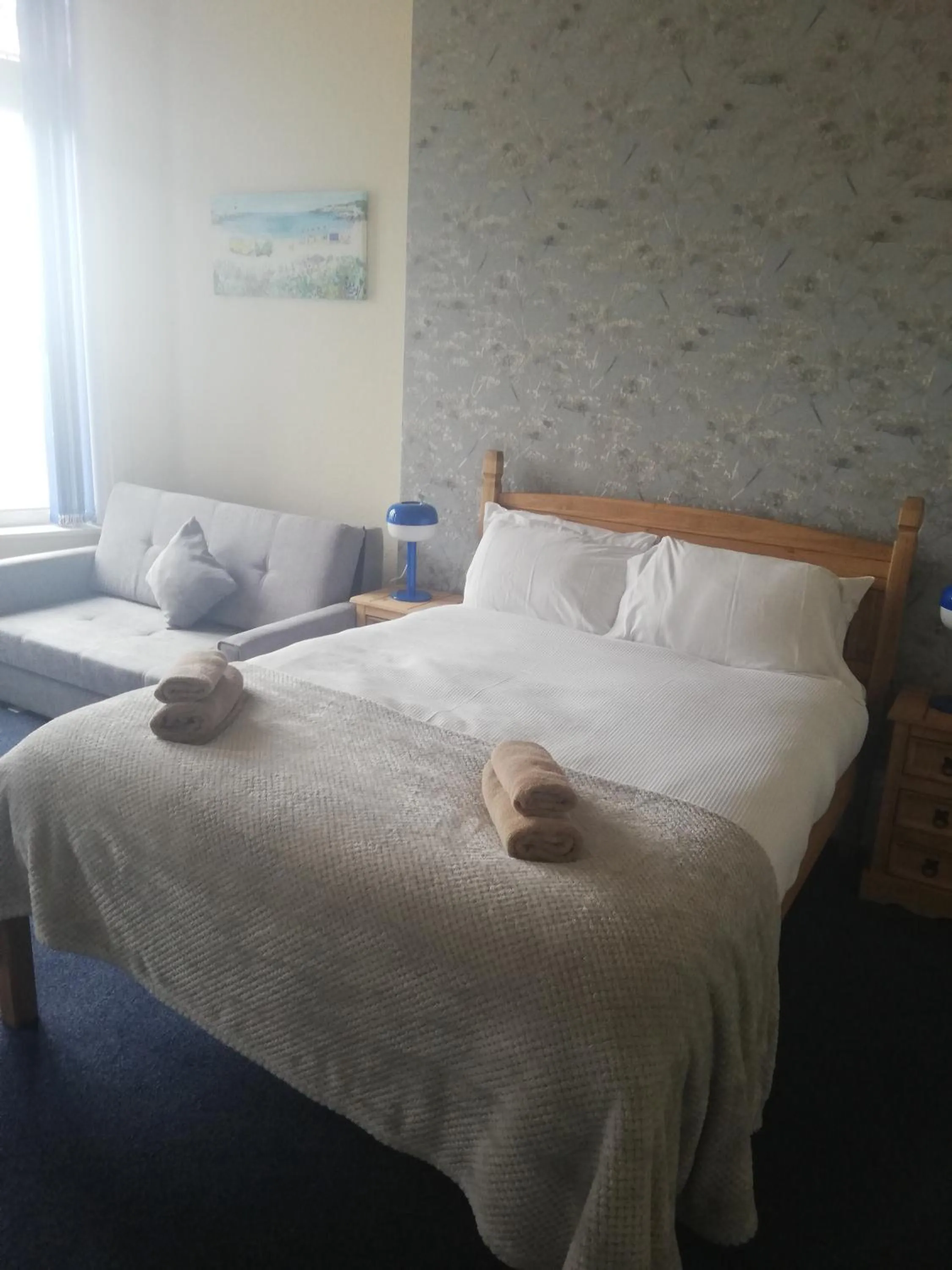 Bed in Camelot Seafront Hotel