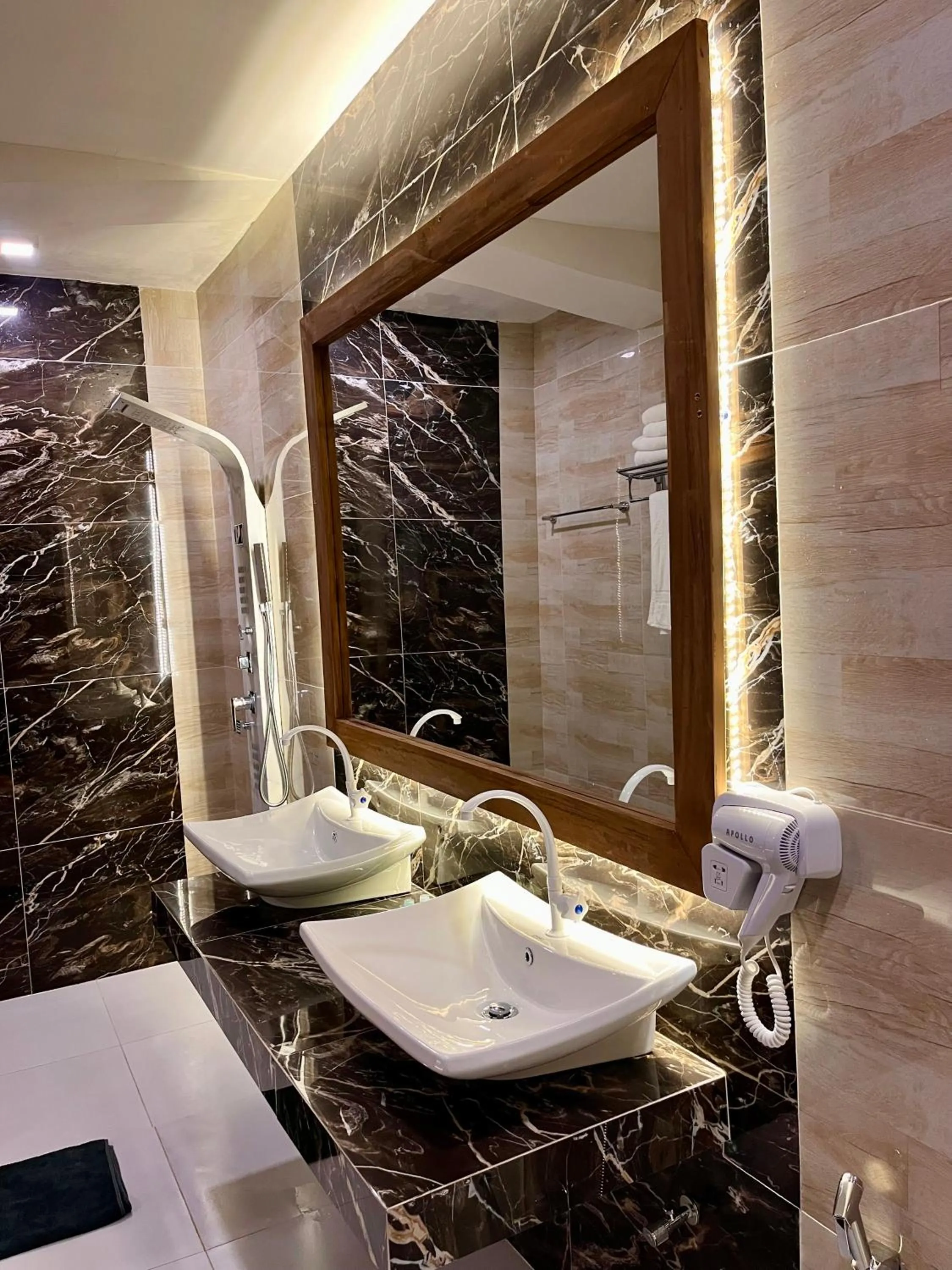 Bathroom in Sundaras Family Suites