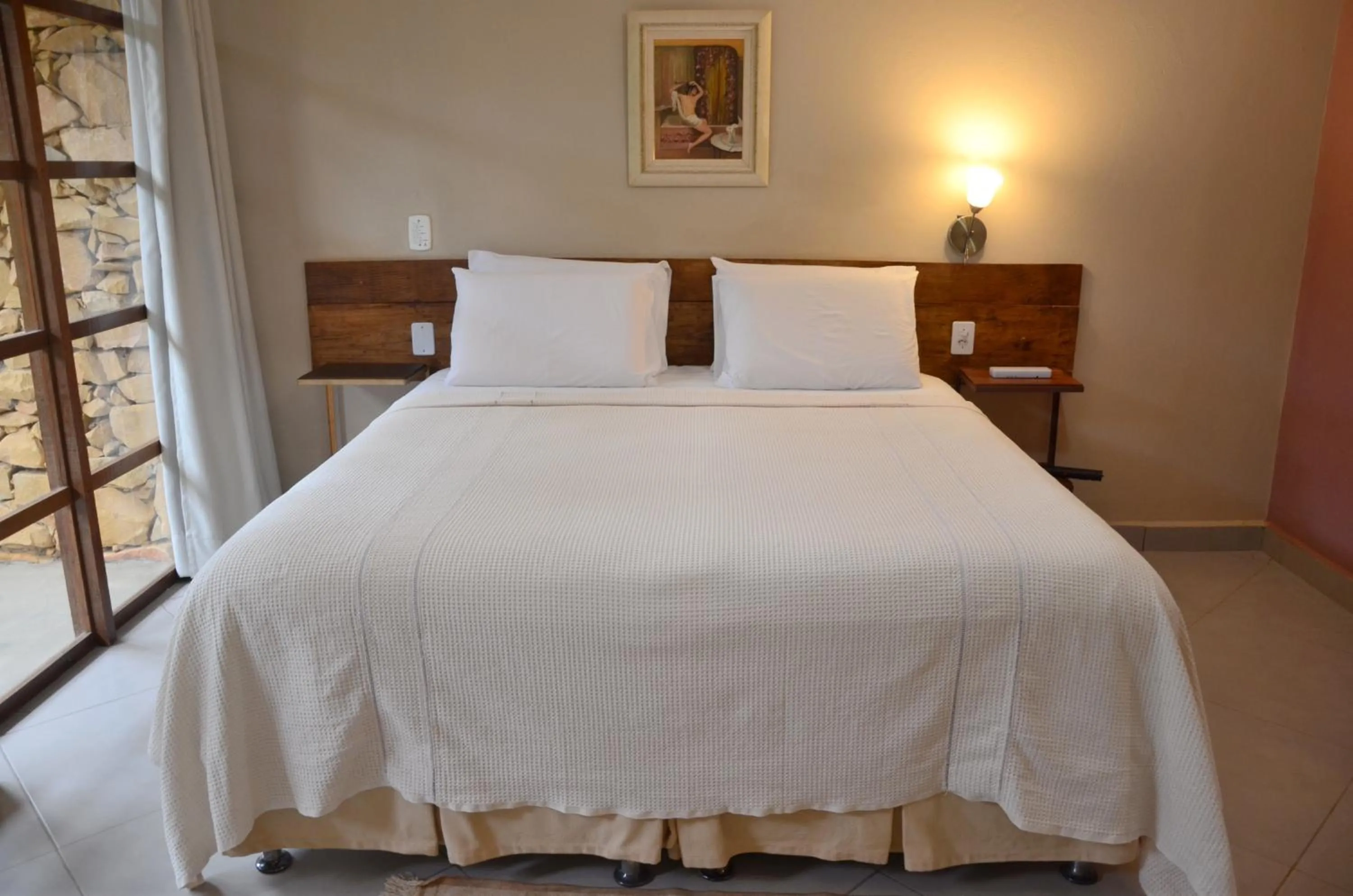 Bed in Pousada Zazen