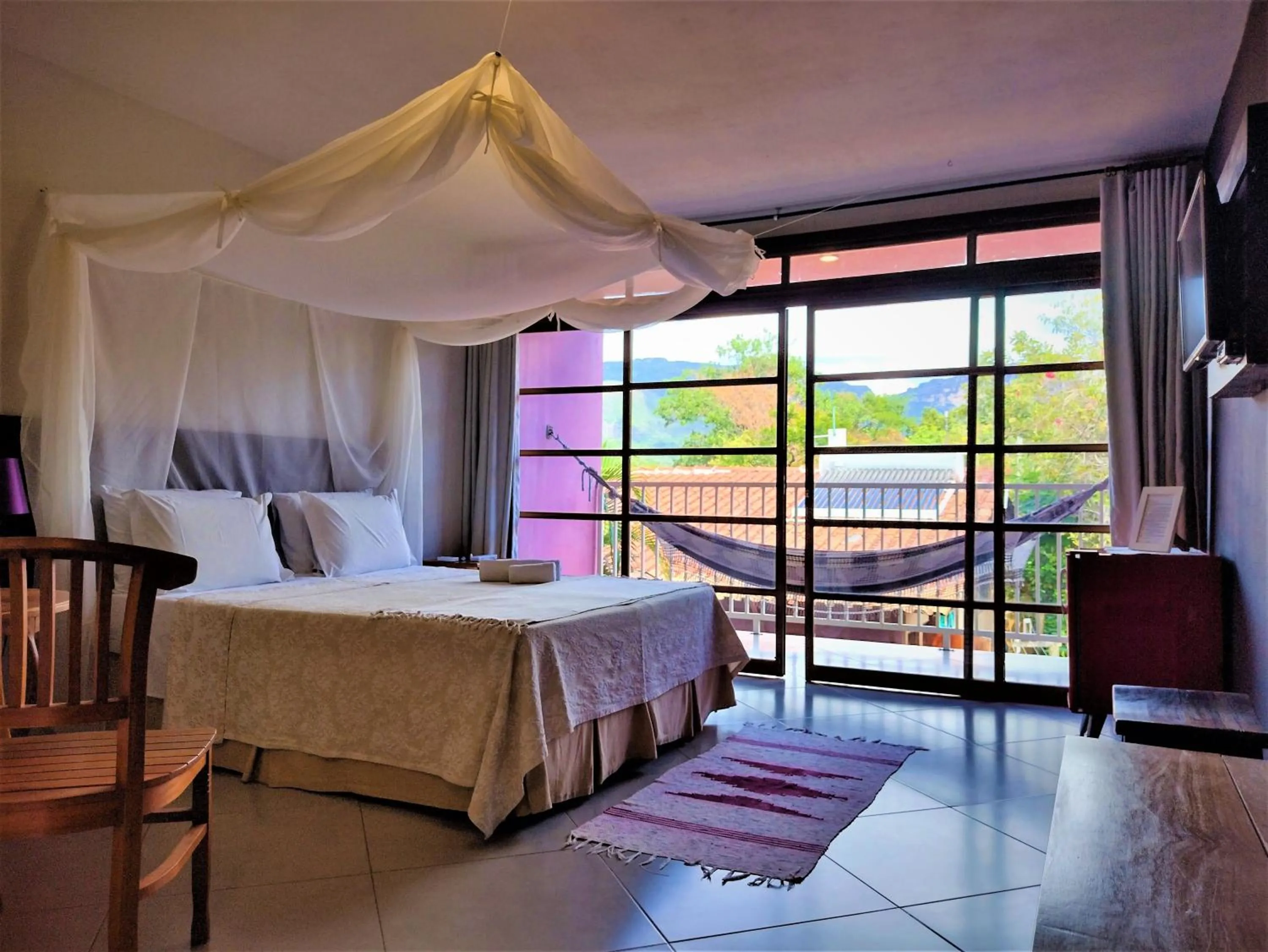 Bed in Pousada Zazen