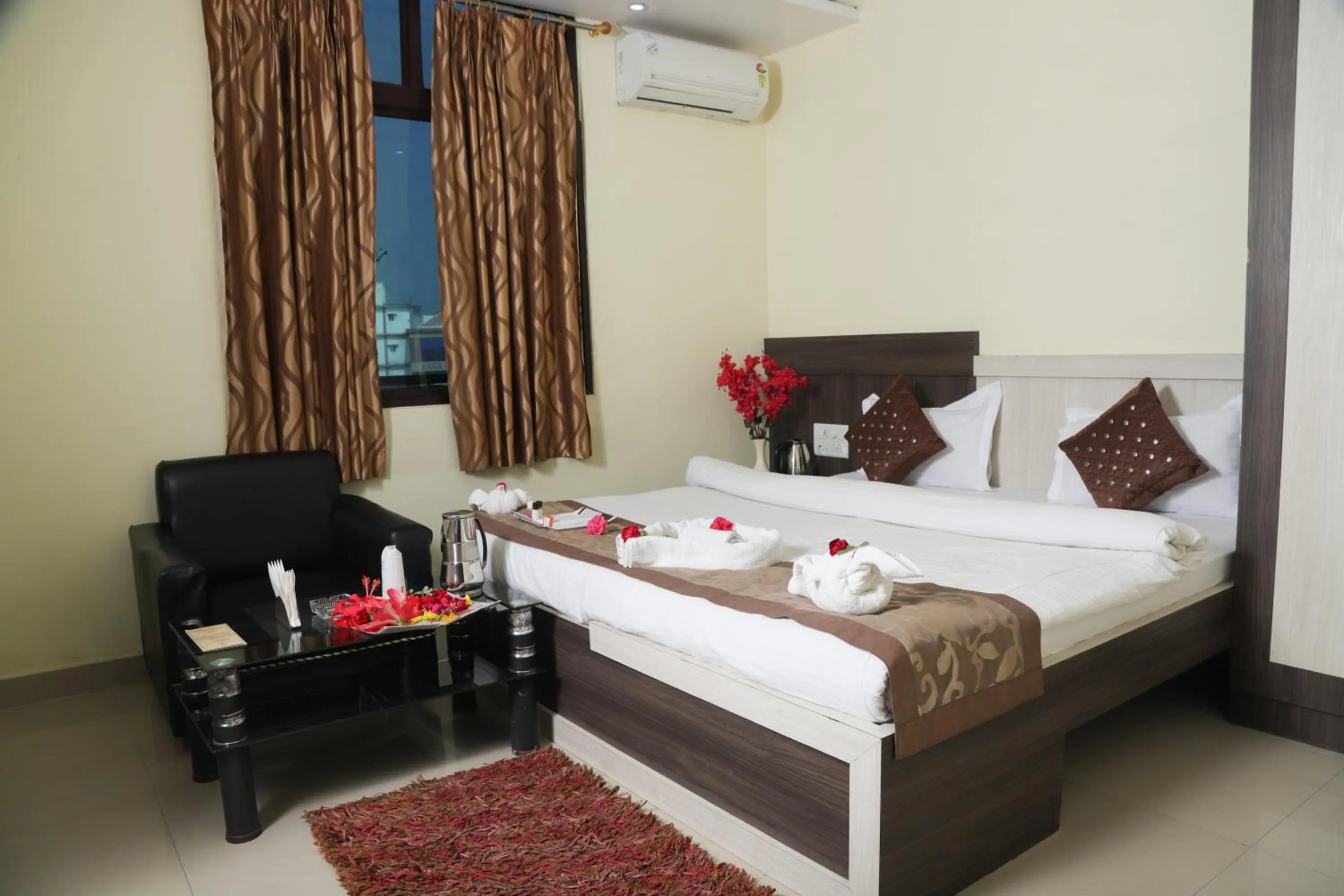 Bed in Hotel Vaishnavi Heights