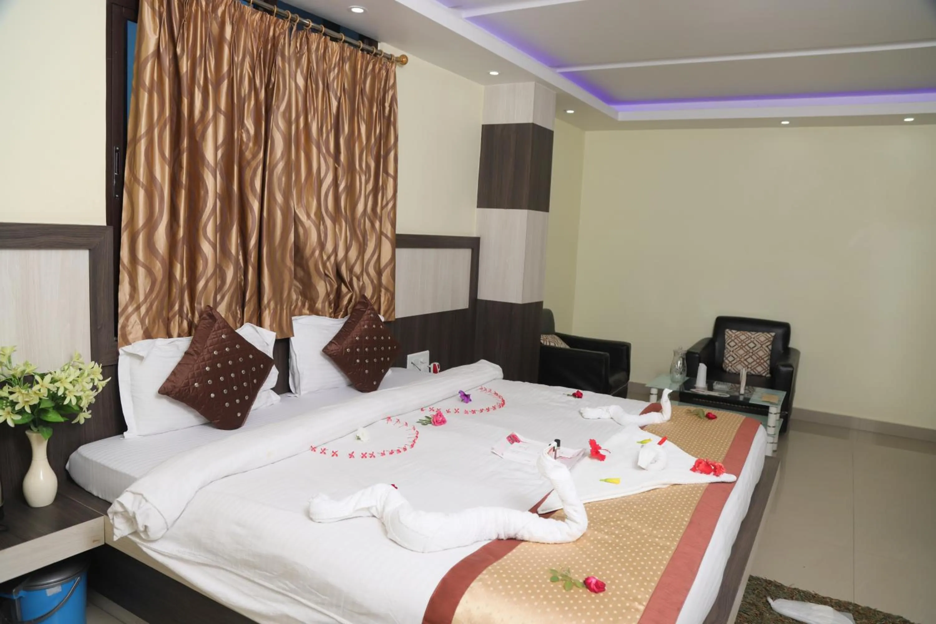 Bed in Hotel Vaishnavi Heights