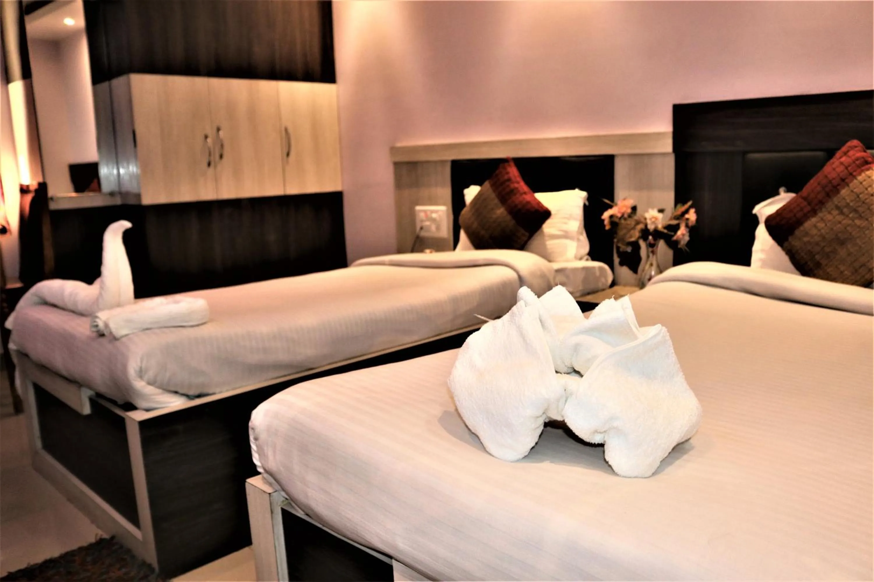 Bed in Hotel Vaishnavi Heights