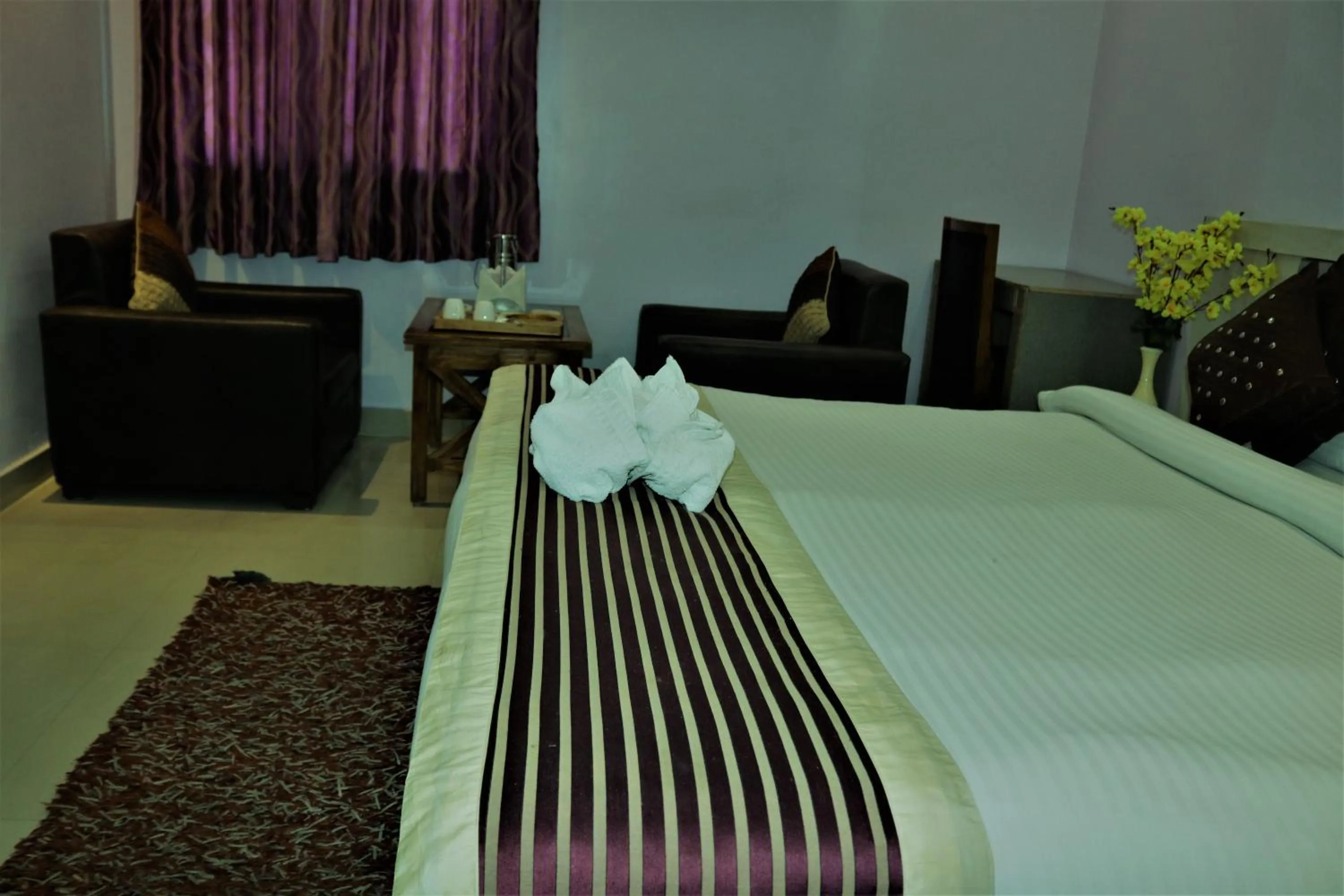 Bed in Hotel Vaishnavi Heights