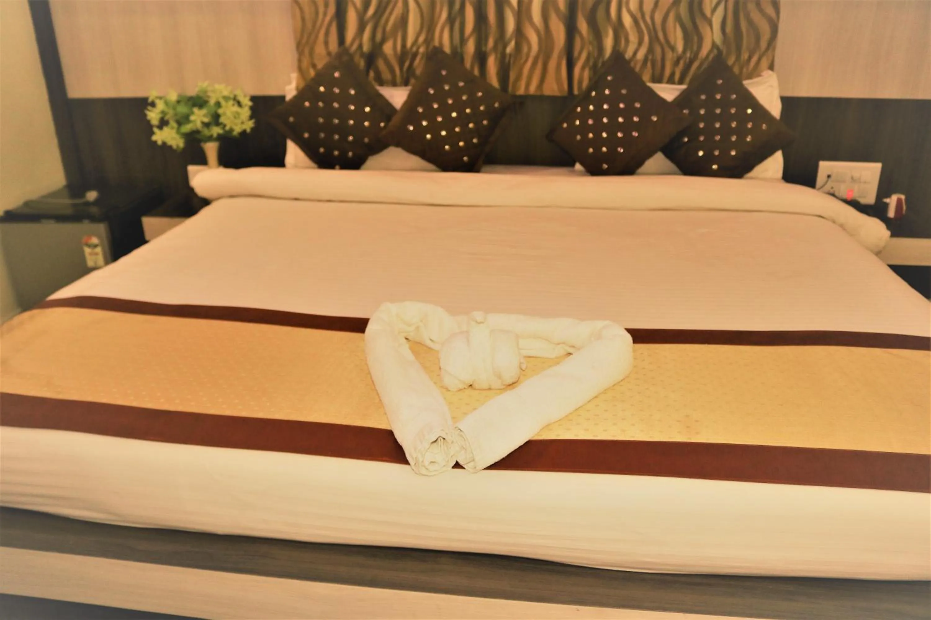 Bed in Hotel Vaishnavi Heights