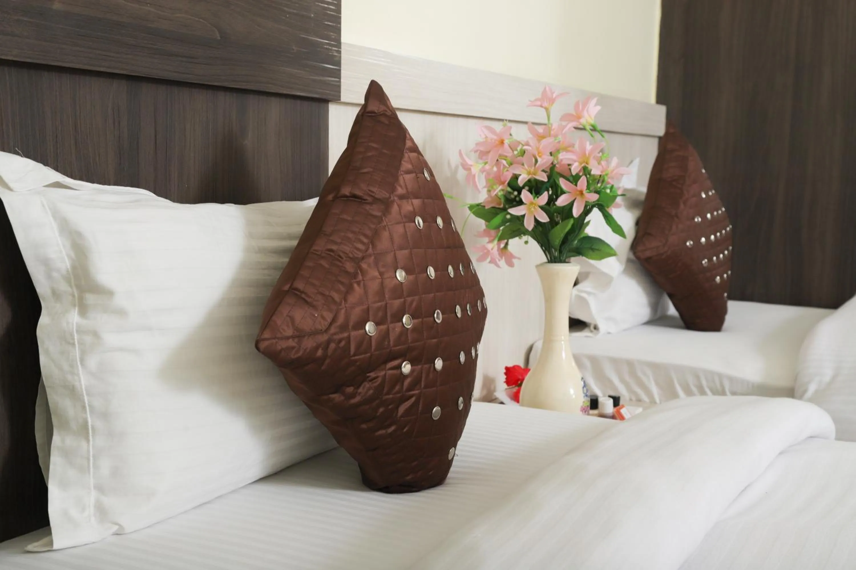 Bed in Hotel Vaishnavi Heights