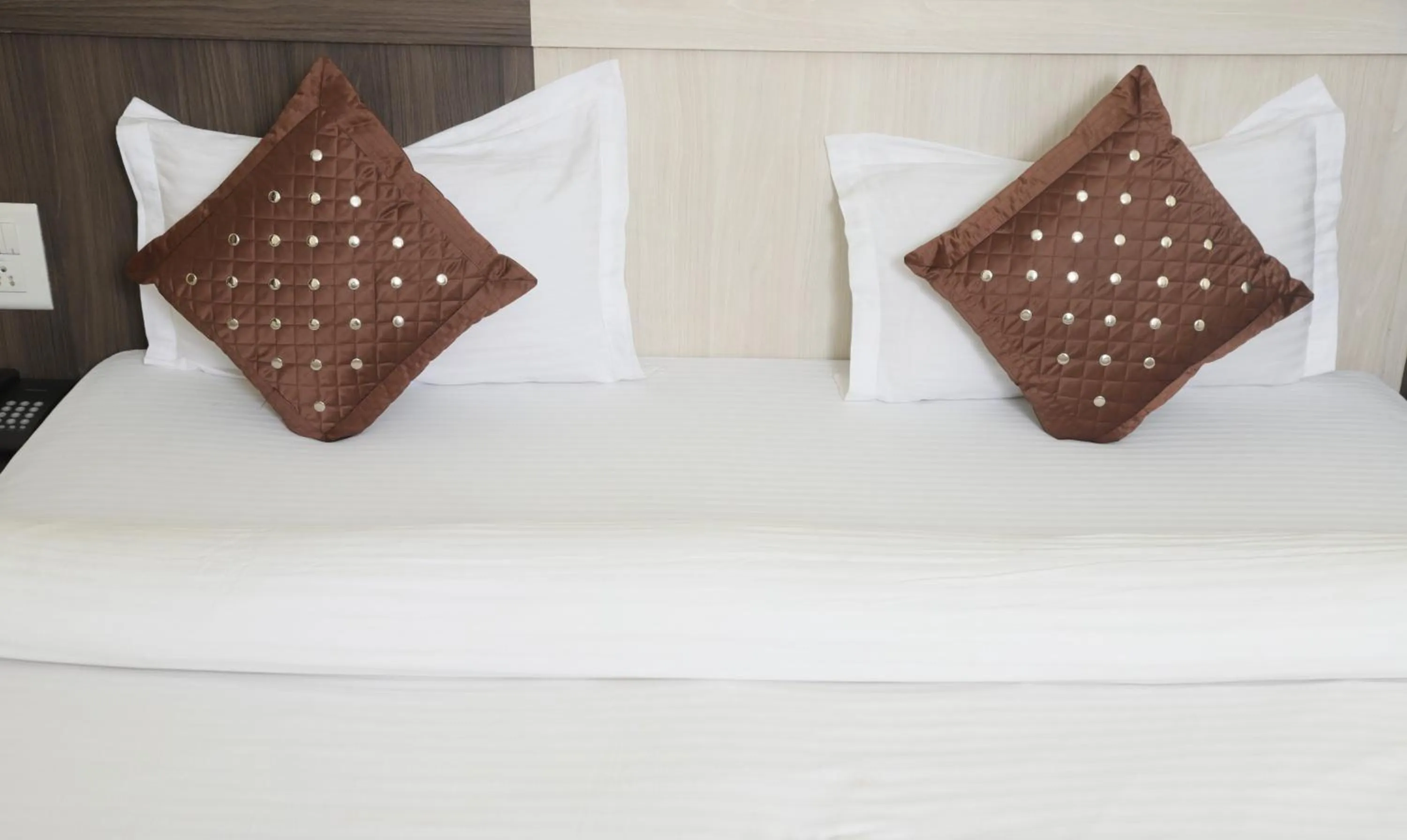 Bed in Hotel Vaishnavi Heights