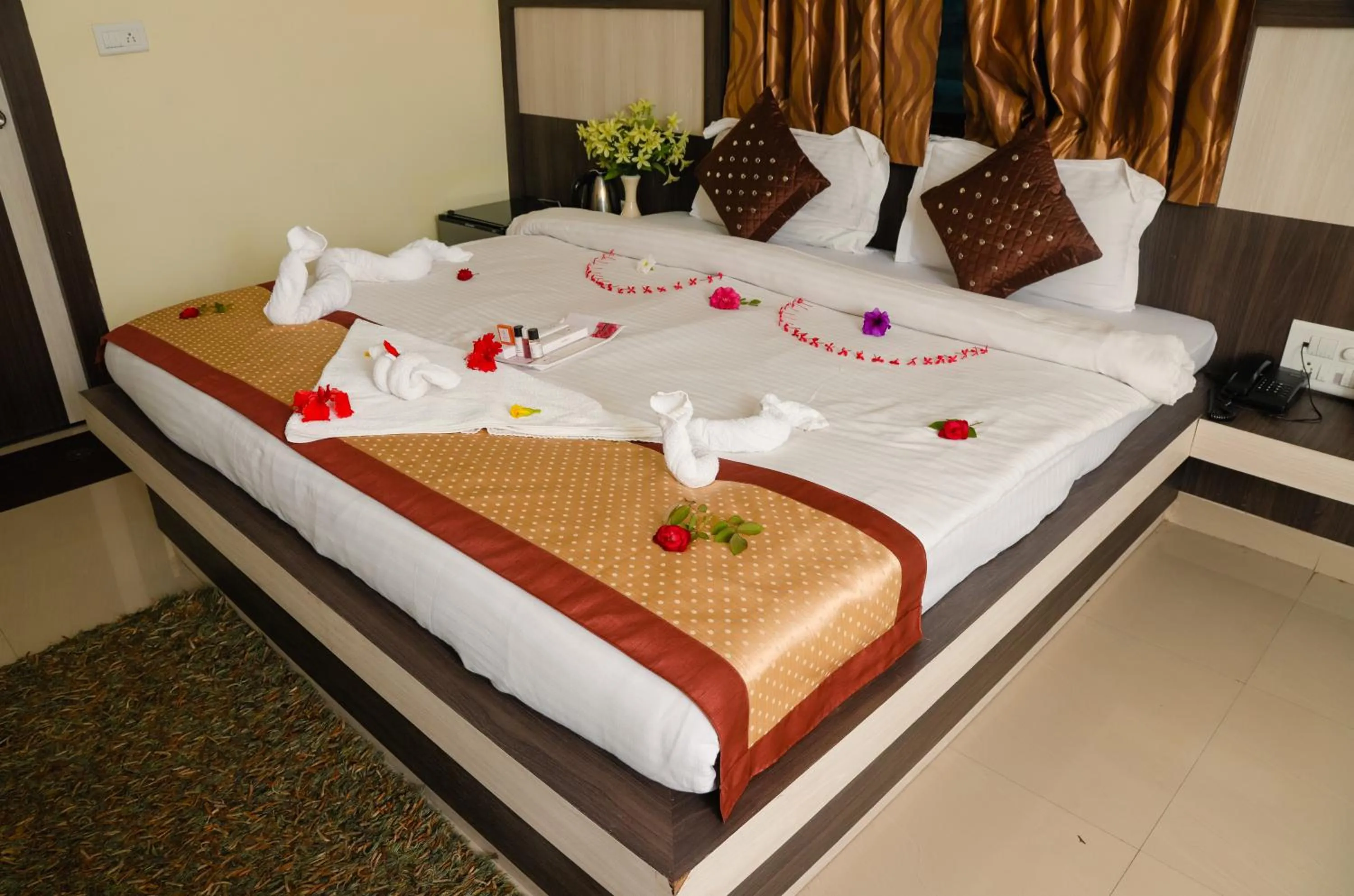 Bed in Hotel Vaishnavi Heights