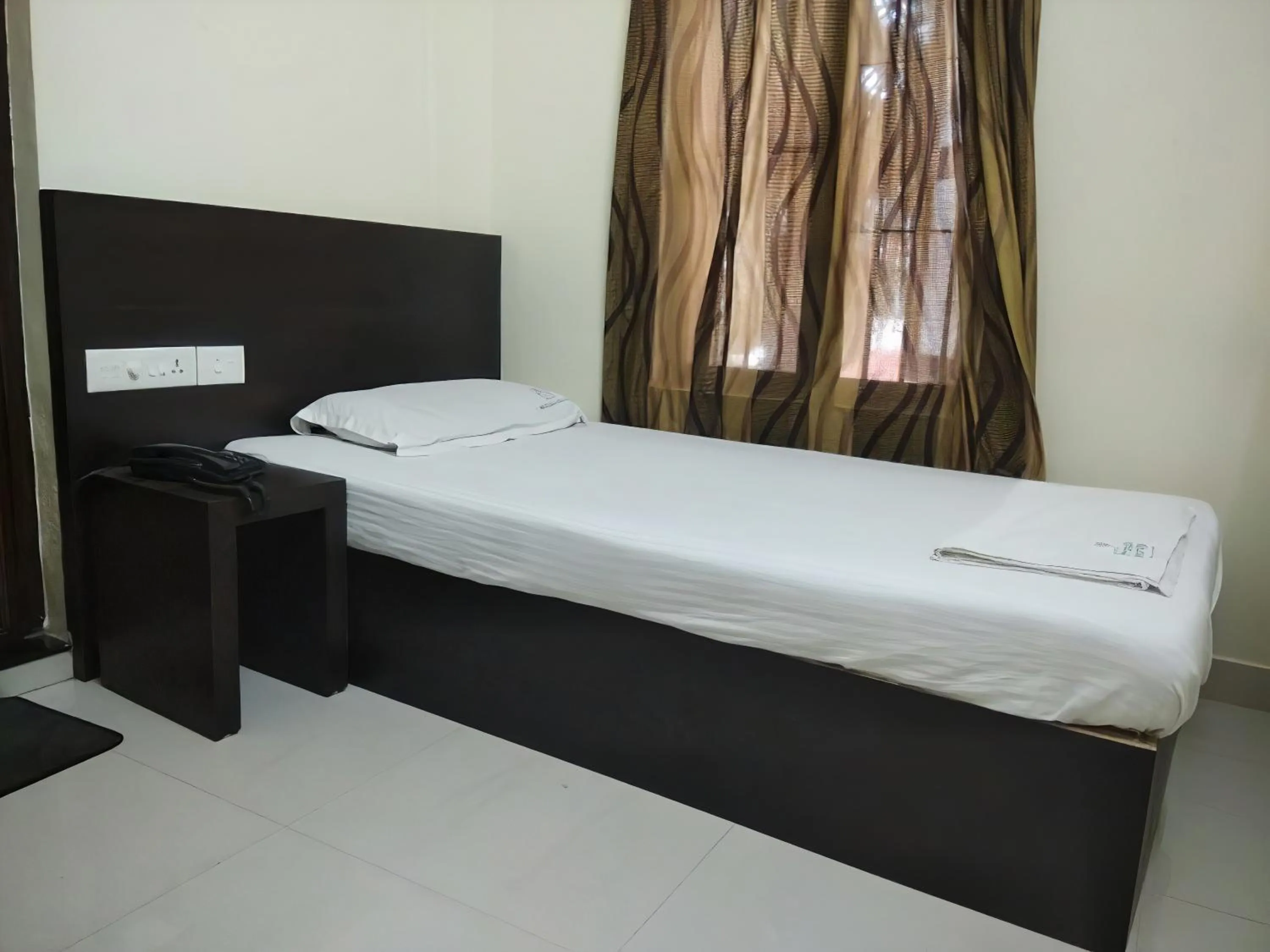 Bed in Hotel Prathiba Heritage