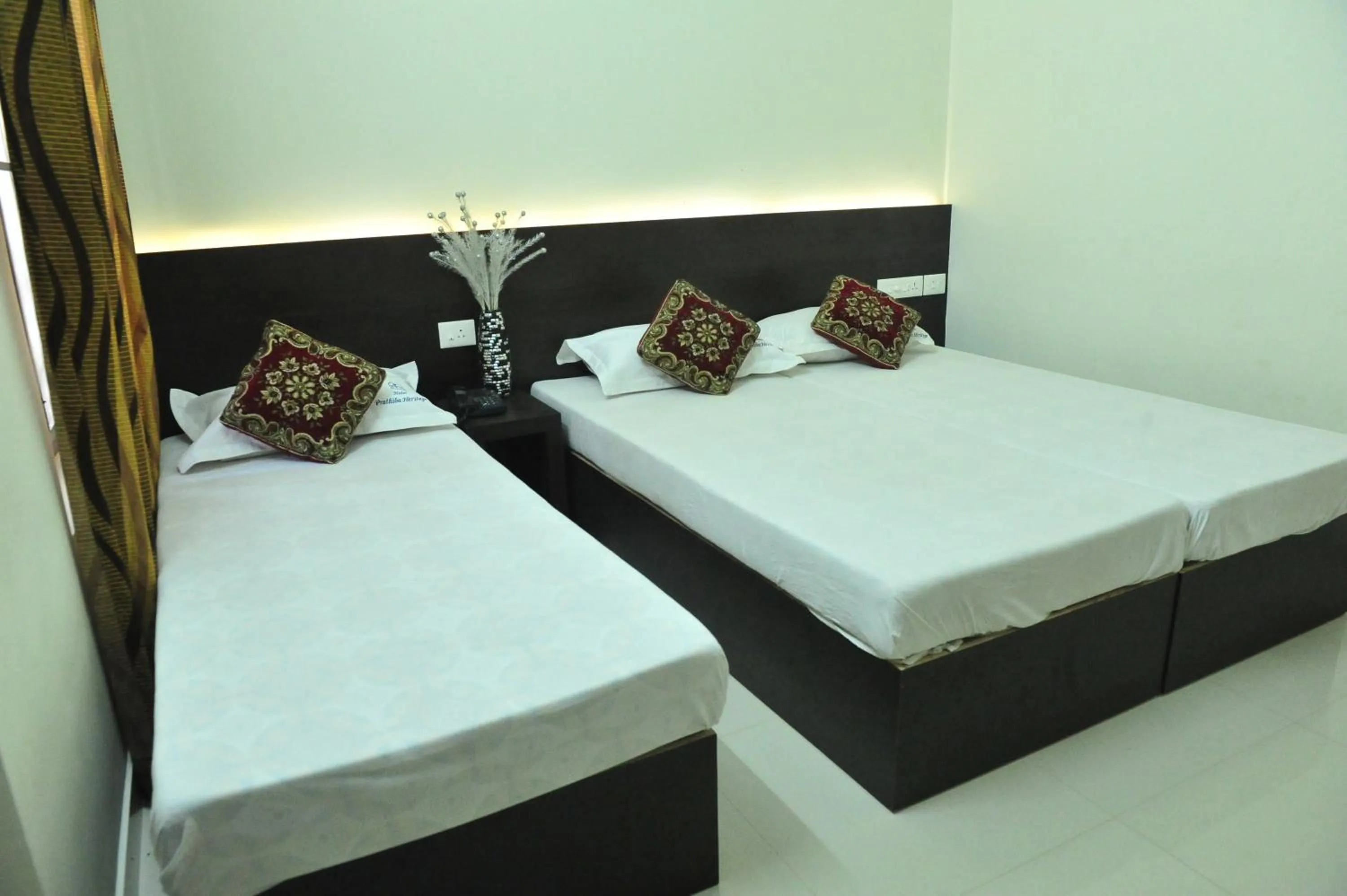 Bed in Hotel Prathiba Heritage