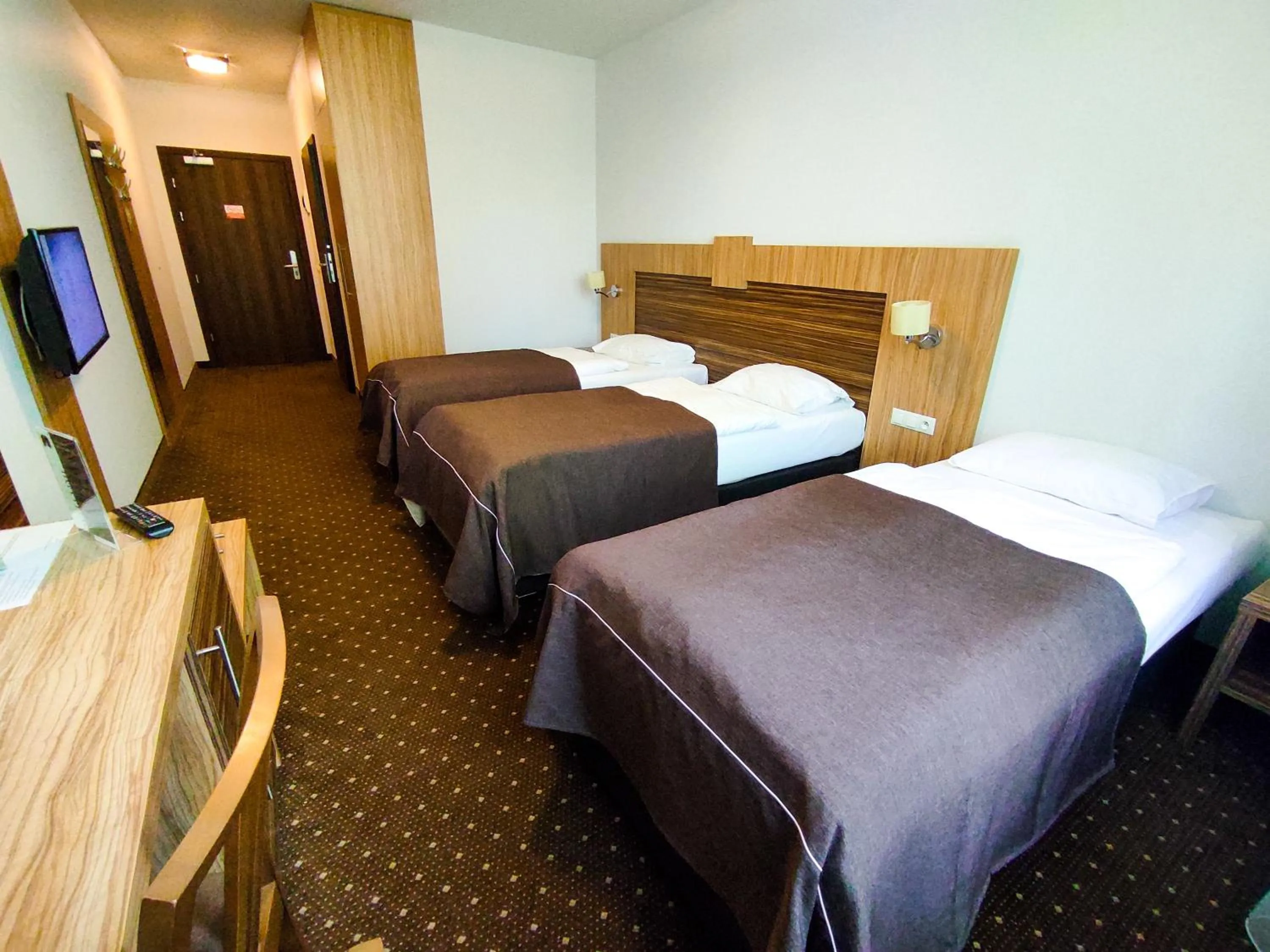 Photo of the whole room, Bed in Hotel Milenium