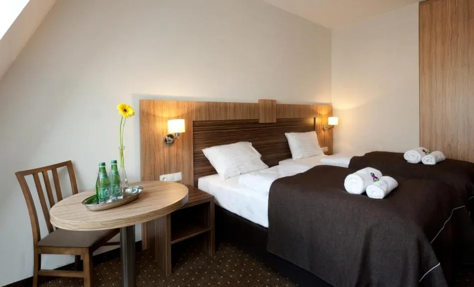 Bed in Hotel Milenium