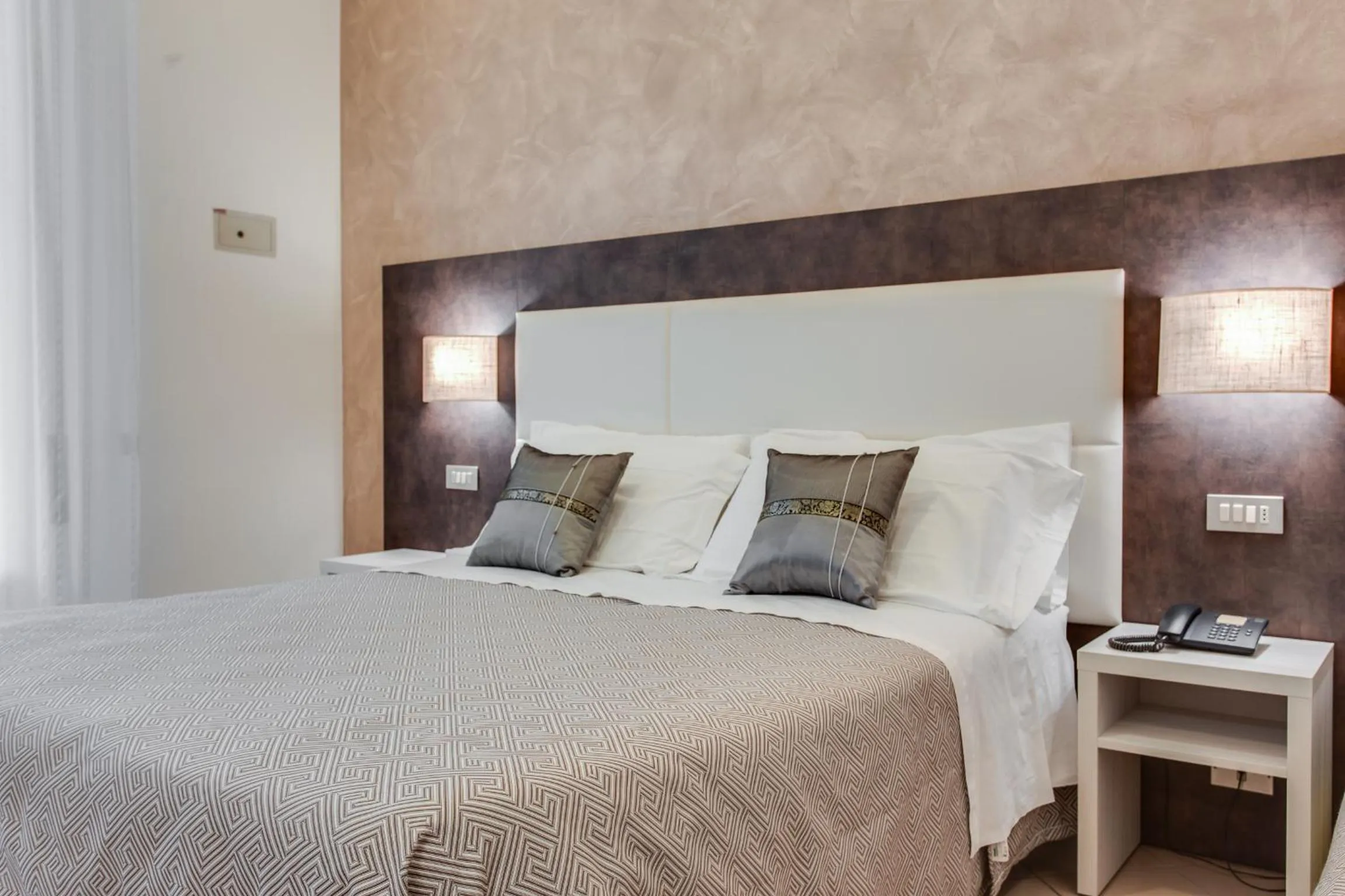 Bed in Hotel Dolcevita