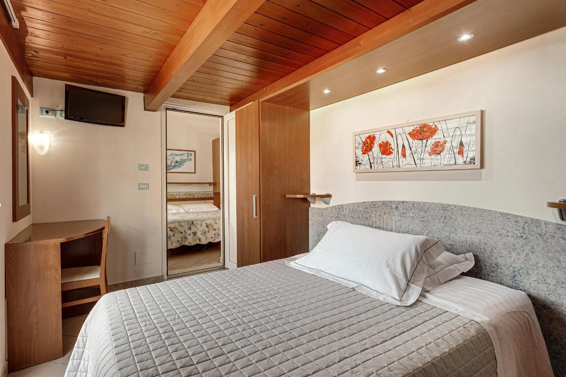 Bed in Hotel Dolcevita