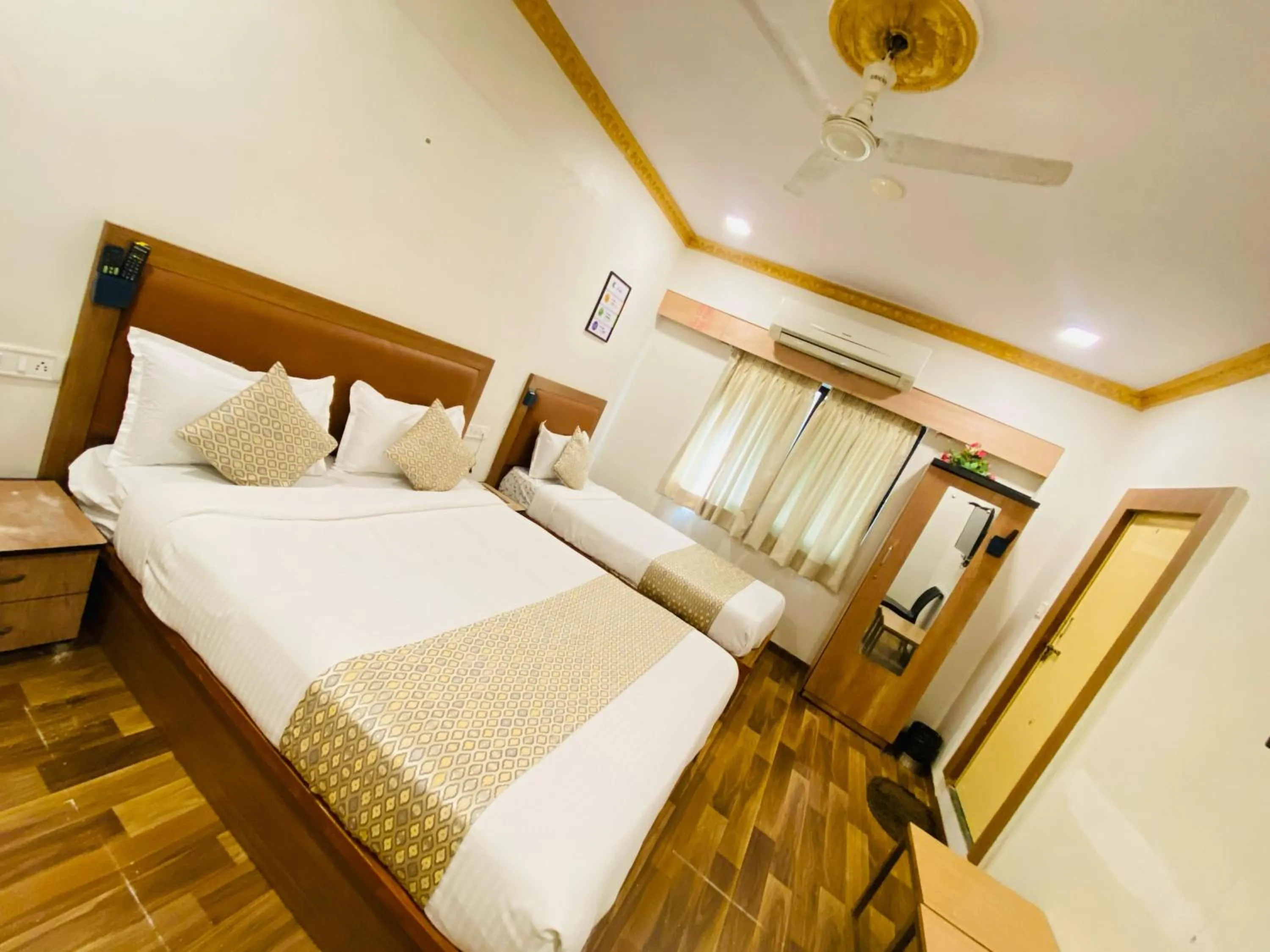 Bed in Hotel ABC Satellite Prahlad Nagar
