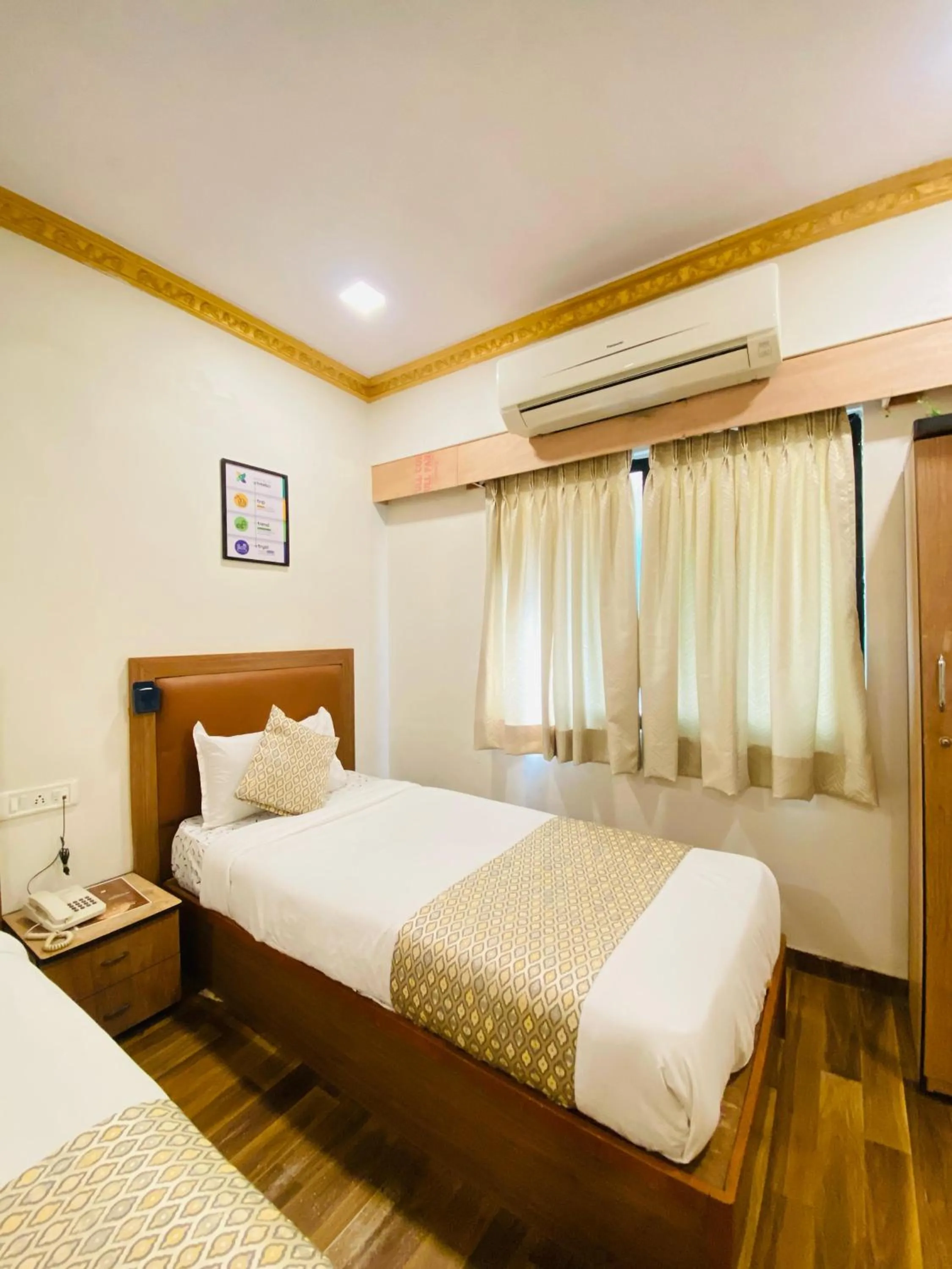 Bed in Hotel ABC Satellite Prahlad Nagar