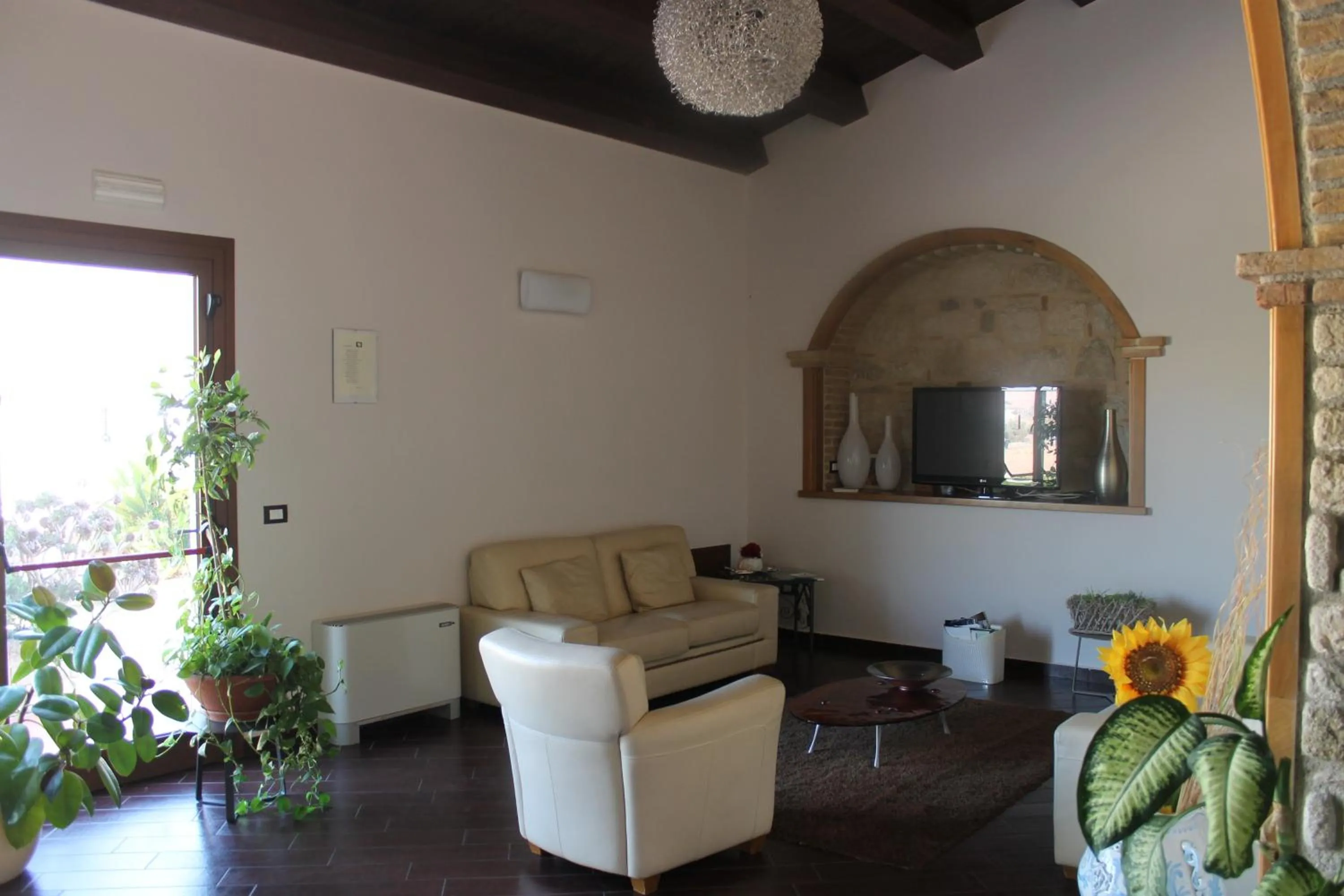 Communal lounge/ TV room in Casale Margherita