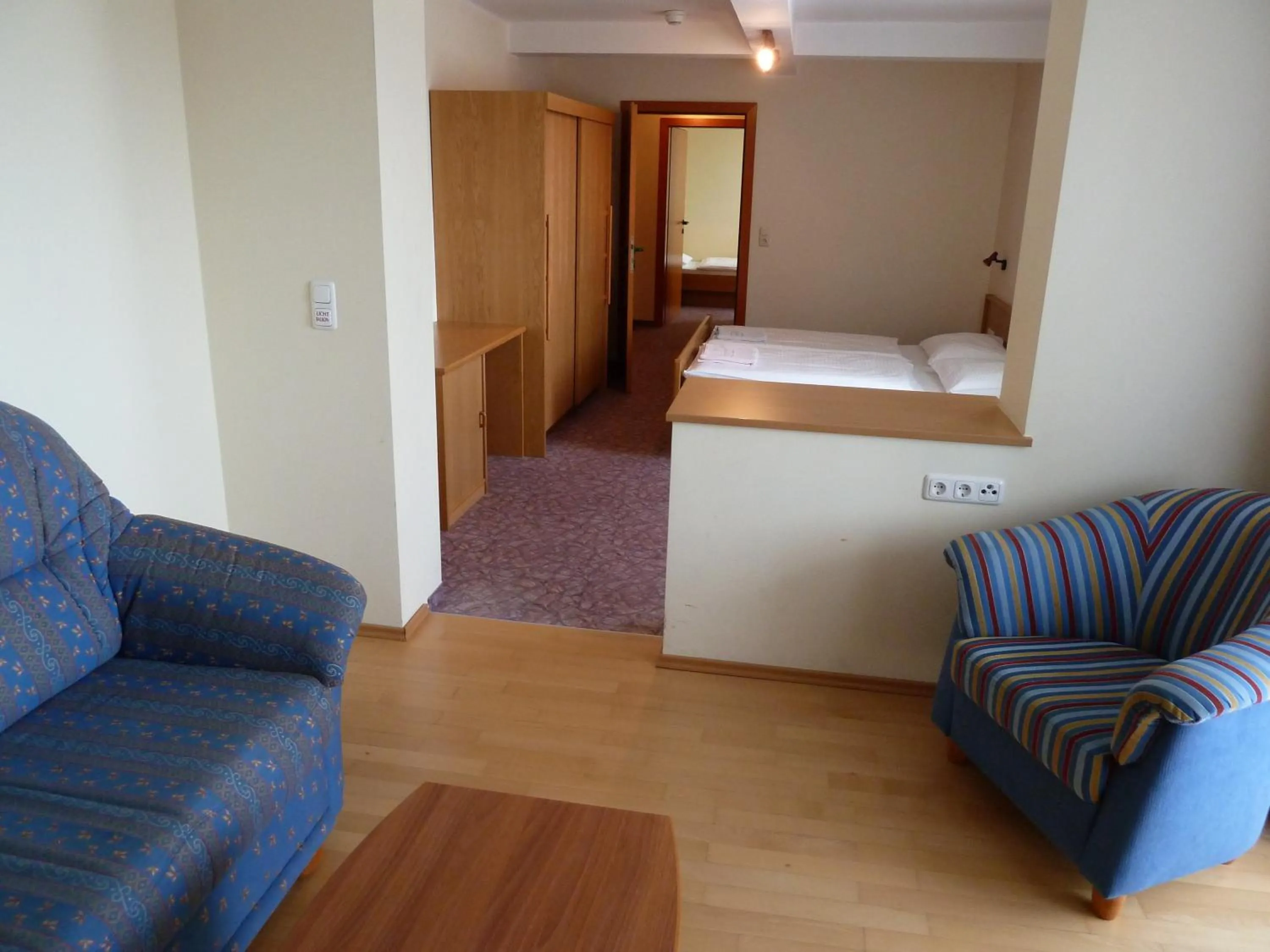 Living room, Bed in Hotel Angerer-Hof