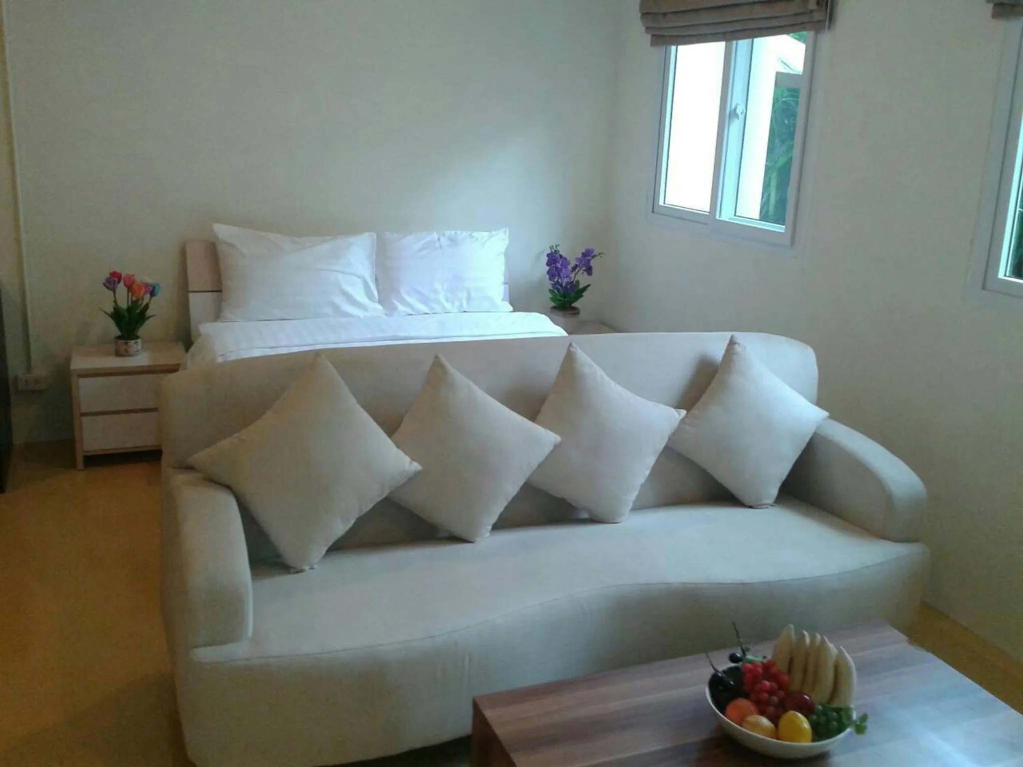 Seating area, Bed in Nakara Residence