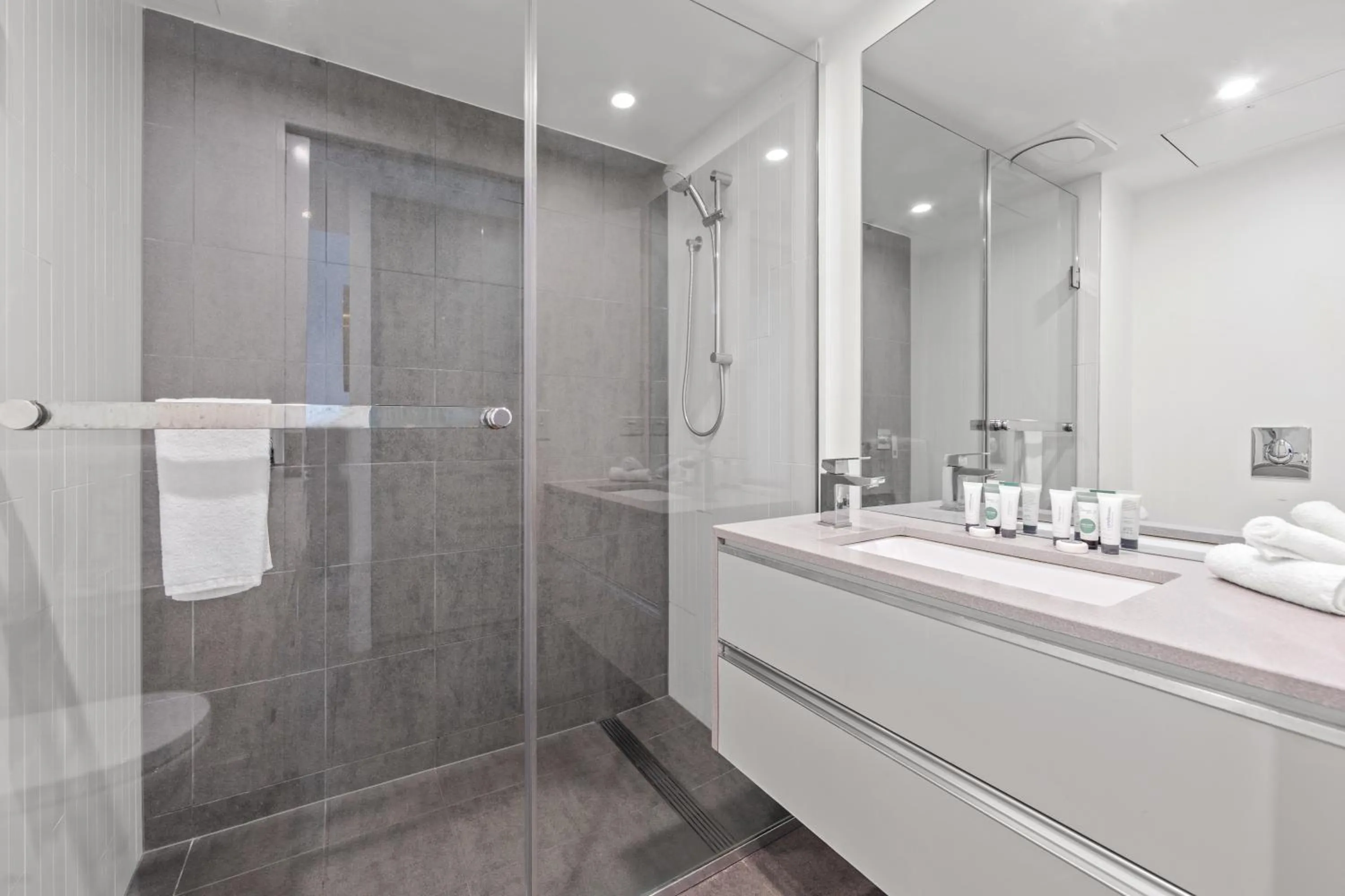 Shower in Trafalgar Lane Apartments by CLLIX