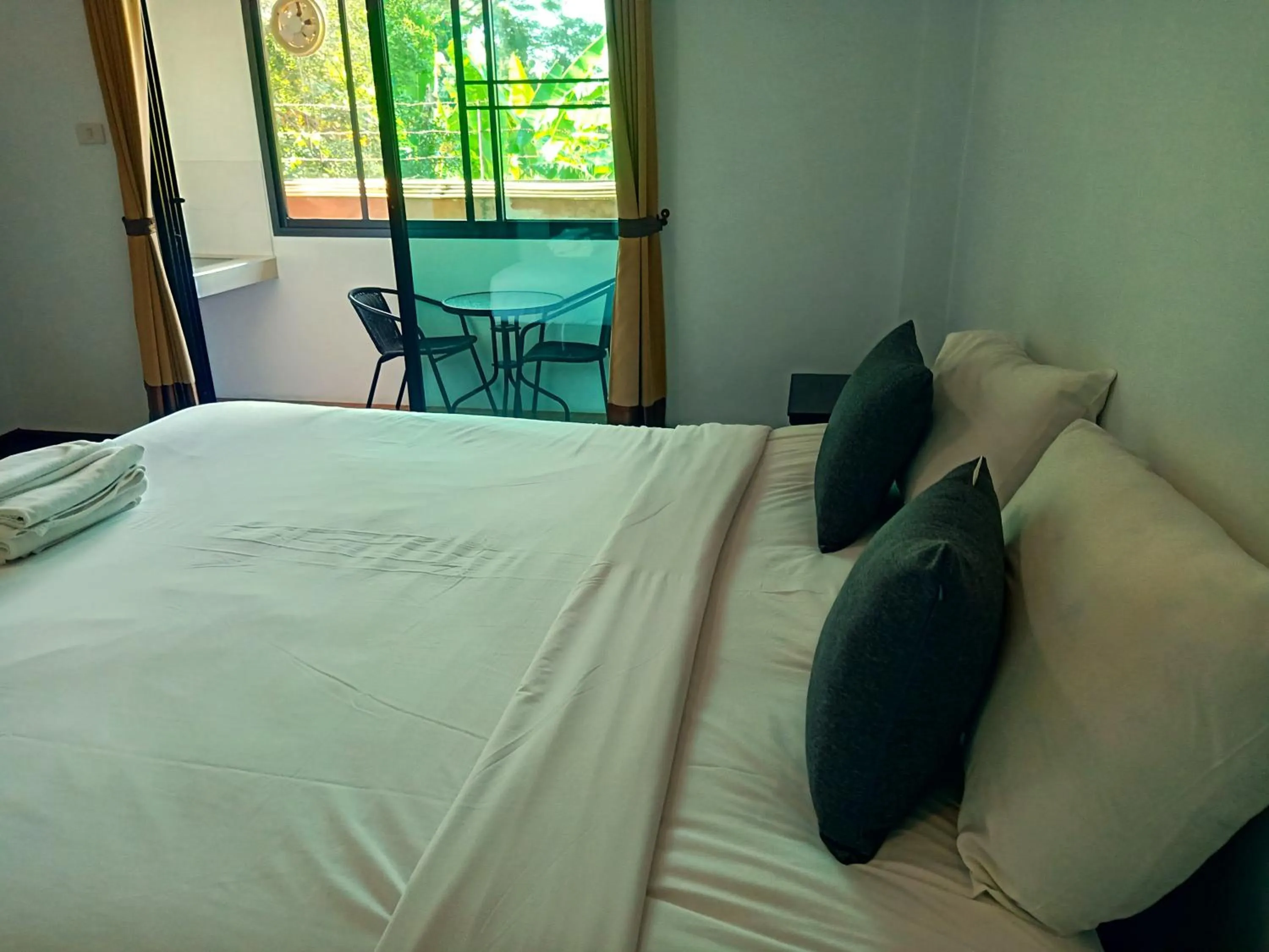 Bed in Be One Boutique Resort
