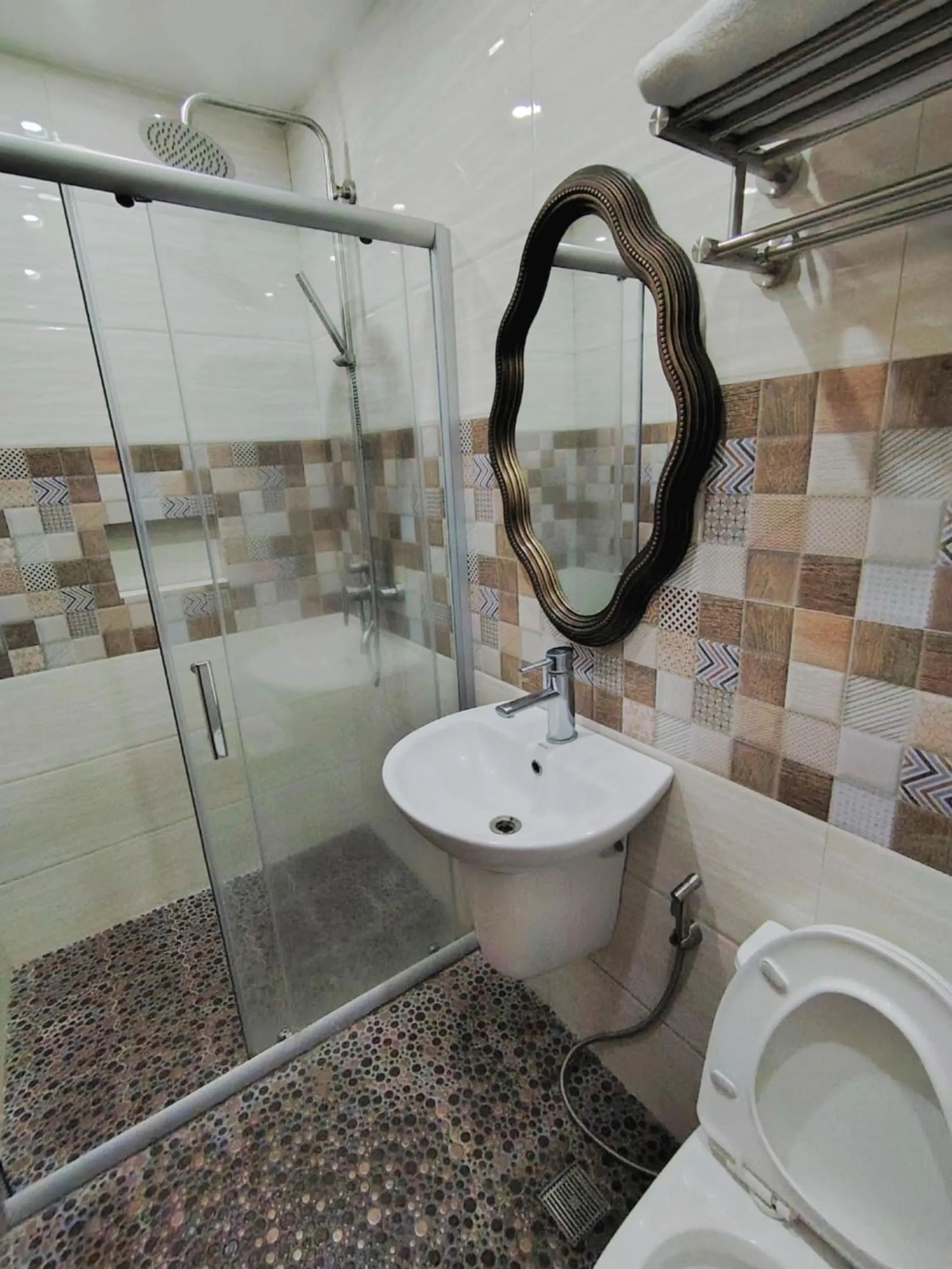 Shower in Ambien's Place Residential Hotel