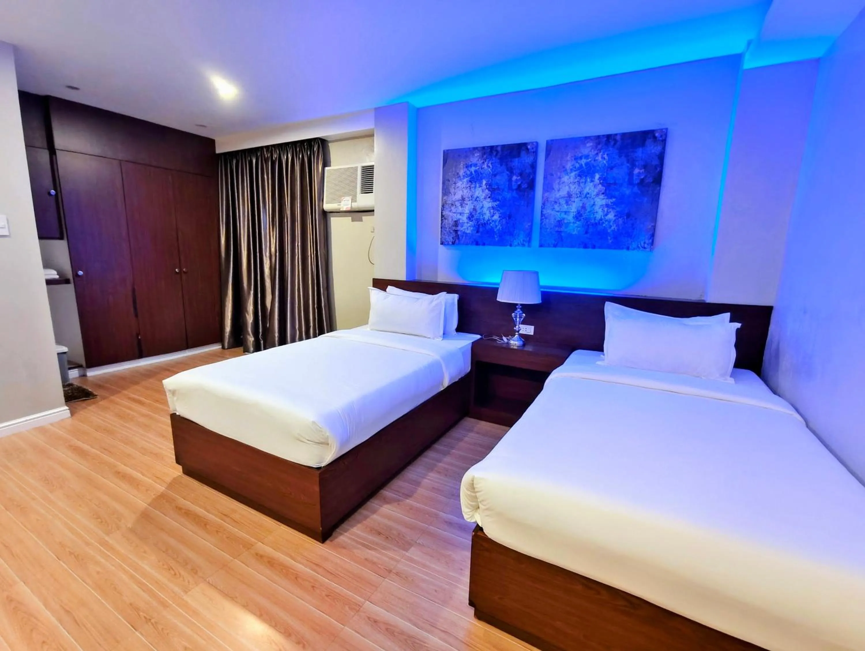 Bed in Ambien's Place Residential Hotel