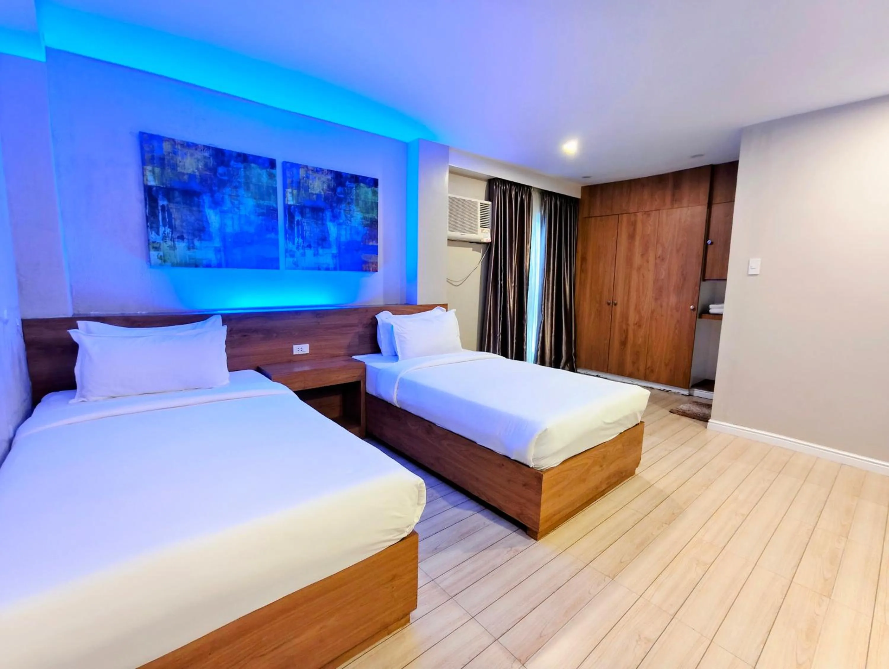 Bed in Ambien's Place Residential Hotel