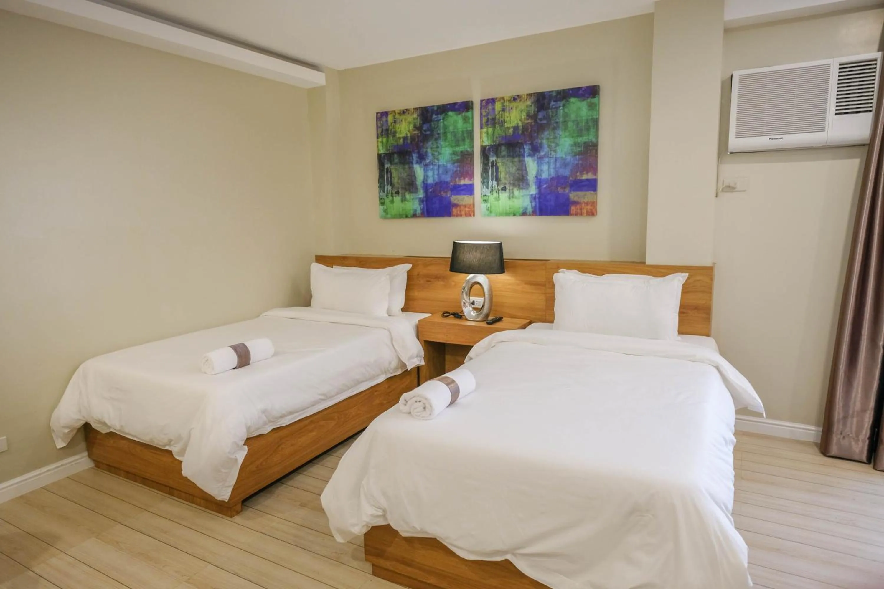 Bed in Ambien's Place Residential Hotel