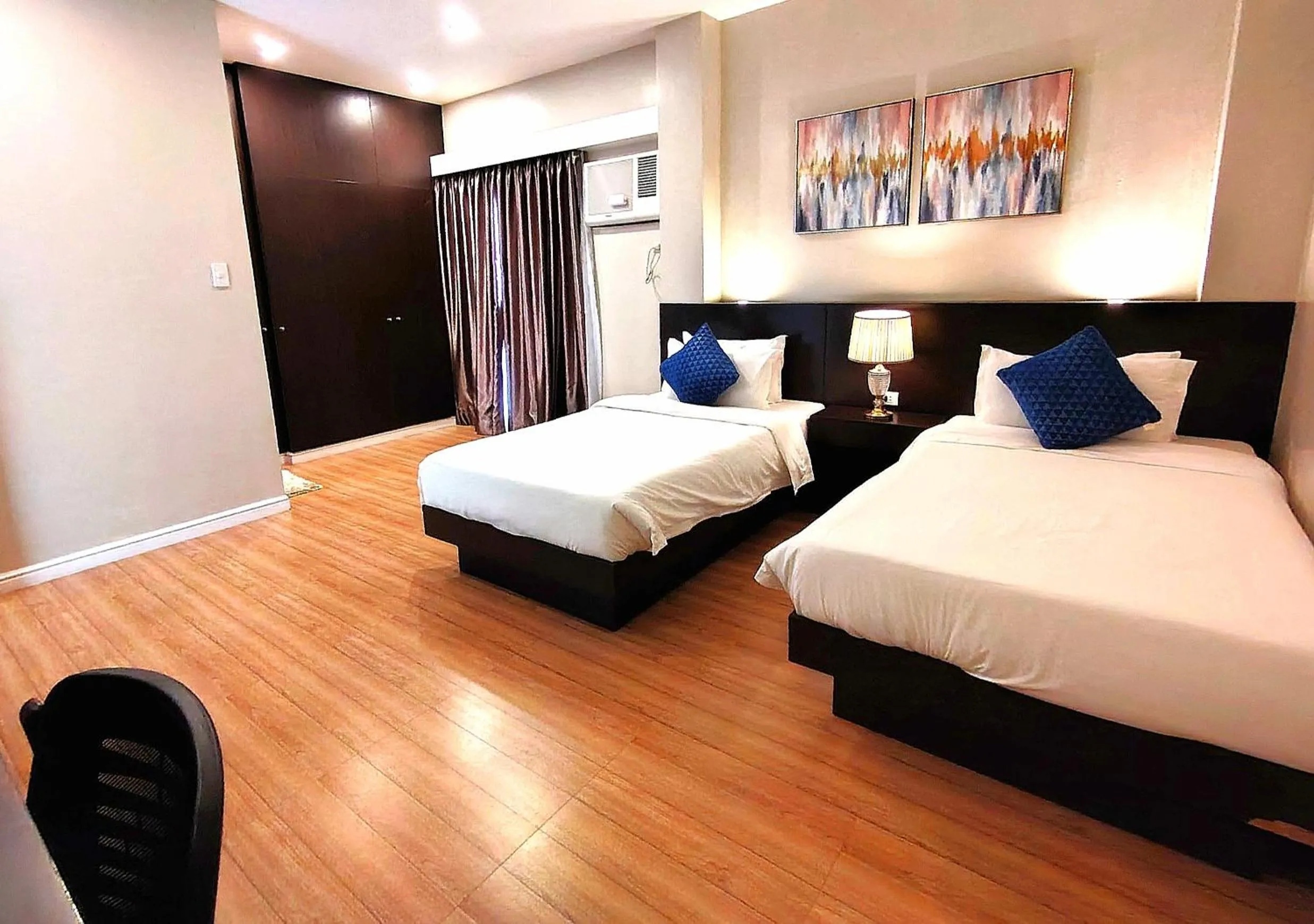 Bed in Ambien's Place Residential Hotel