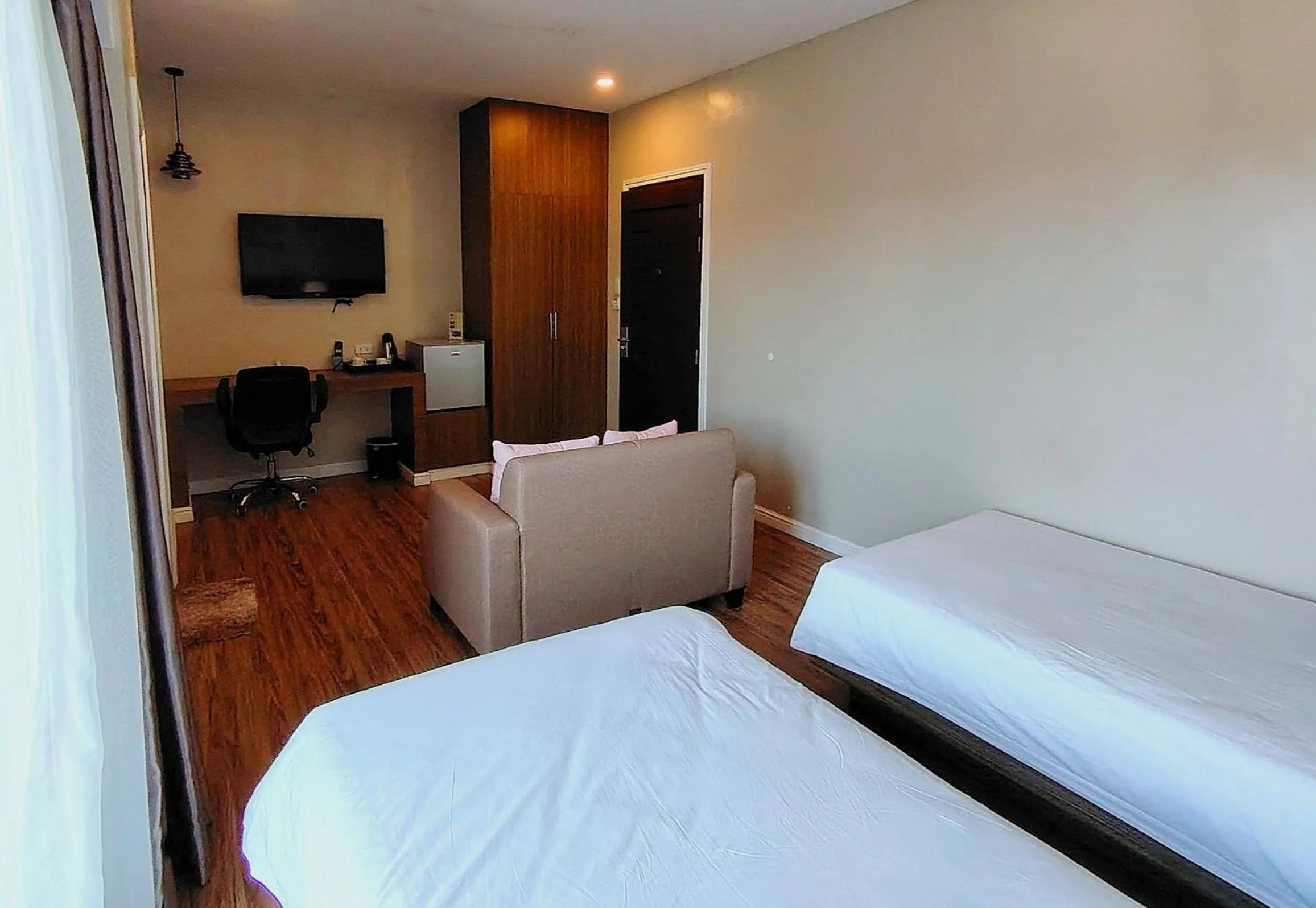 TV and multimedia, Bed in Ambien's Place Residential Hotel