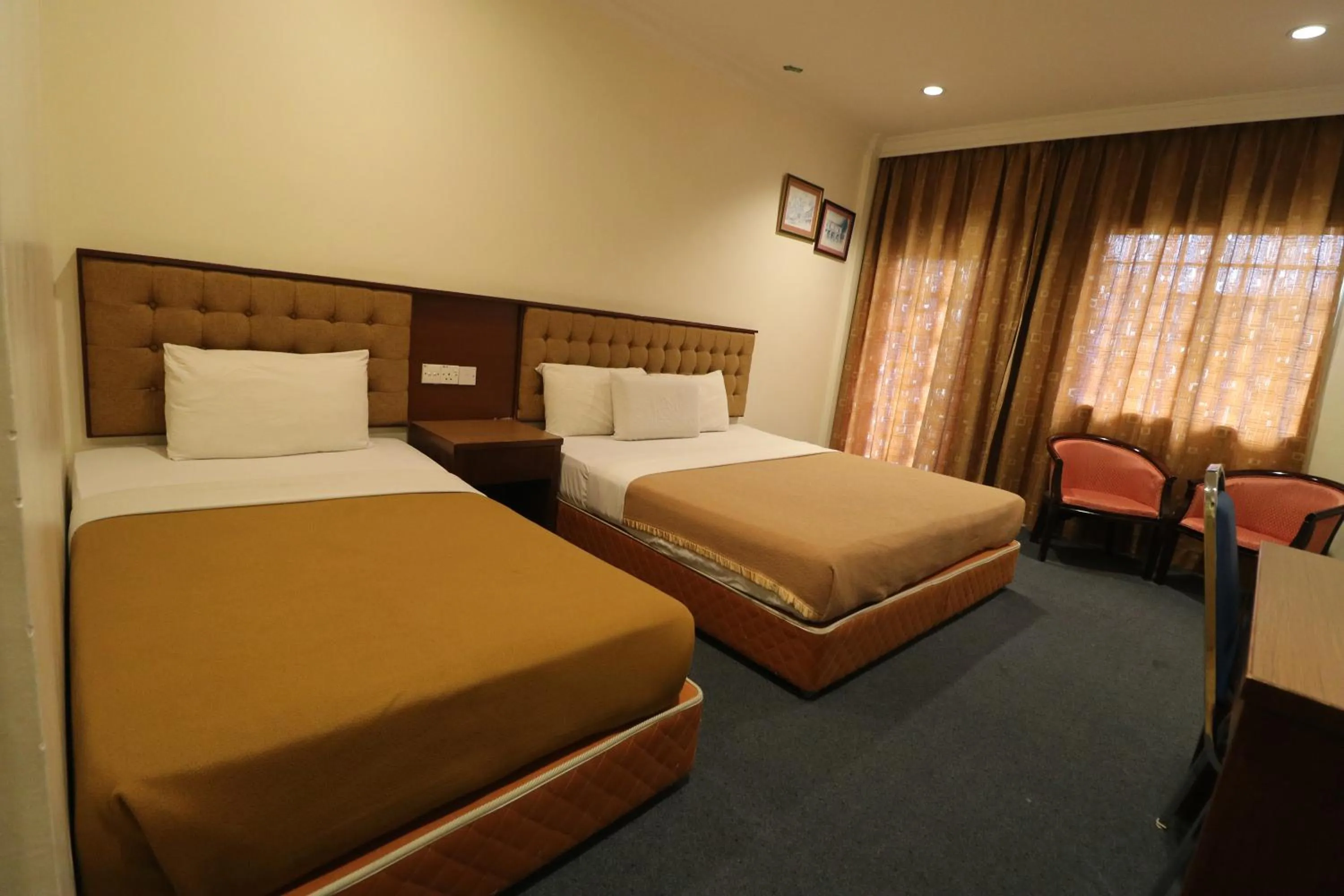 Bed in Iris House Hotel Cameron Highlands