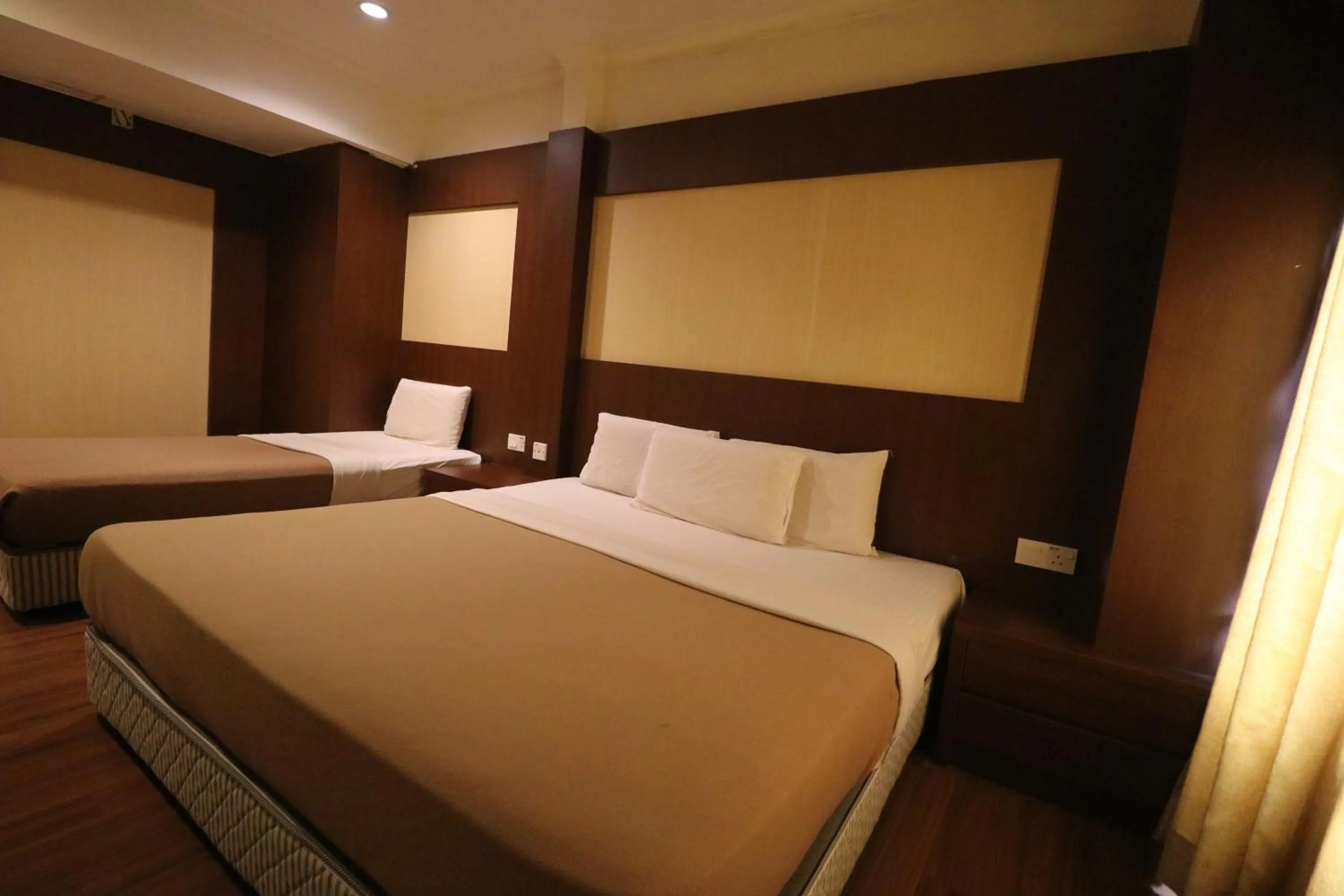 Bed in Iris House Hotel Cameron Highlands