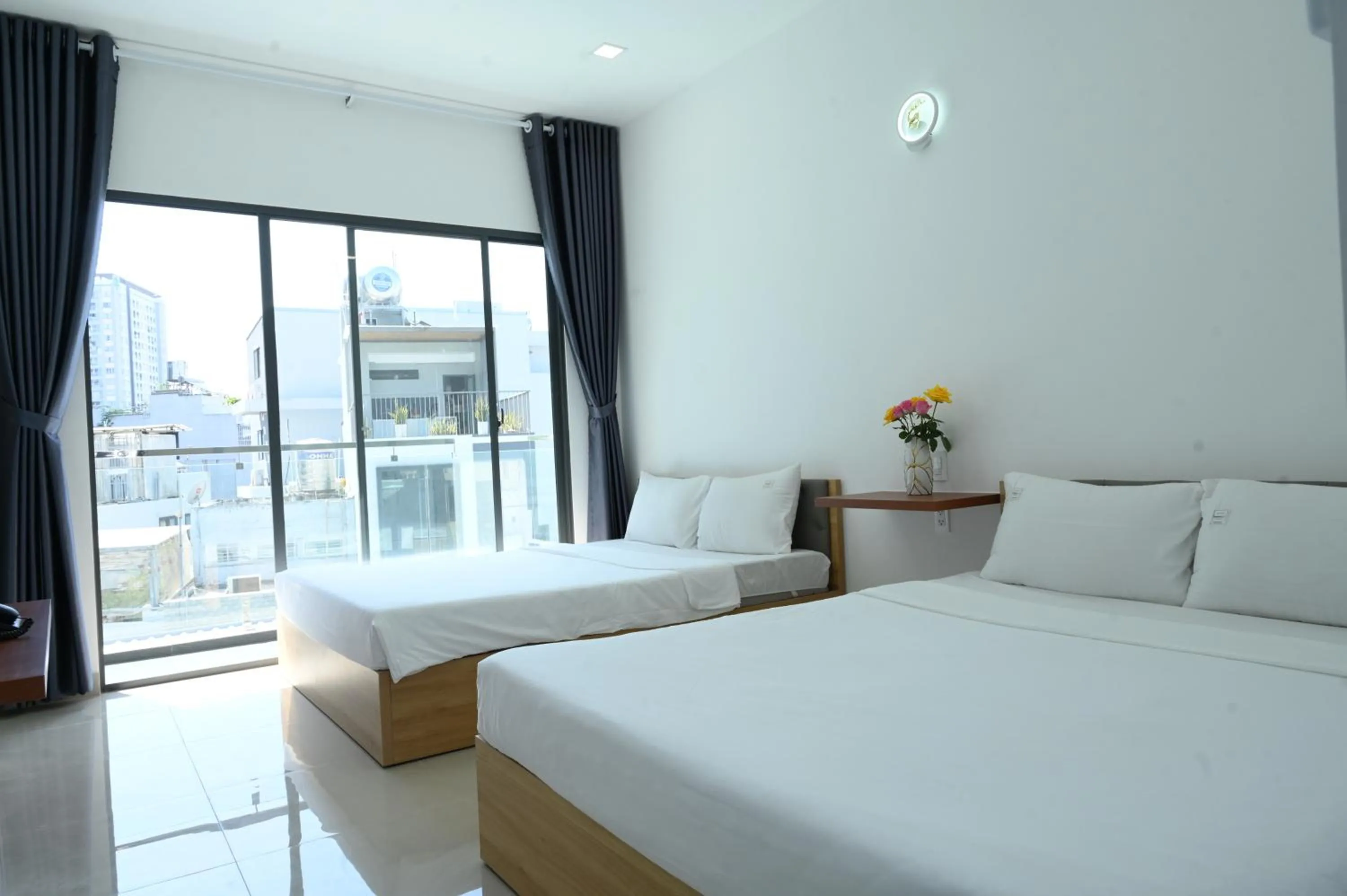 Bed in TalaSaiGon Hotel
