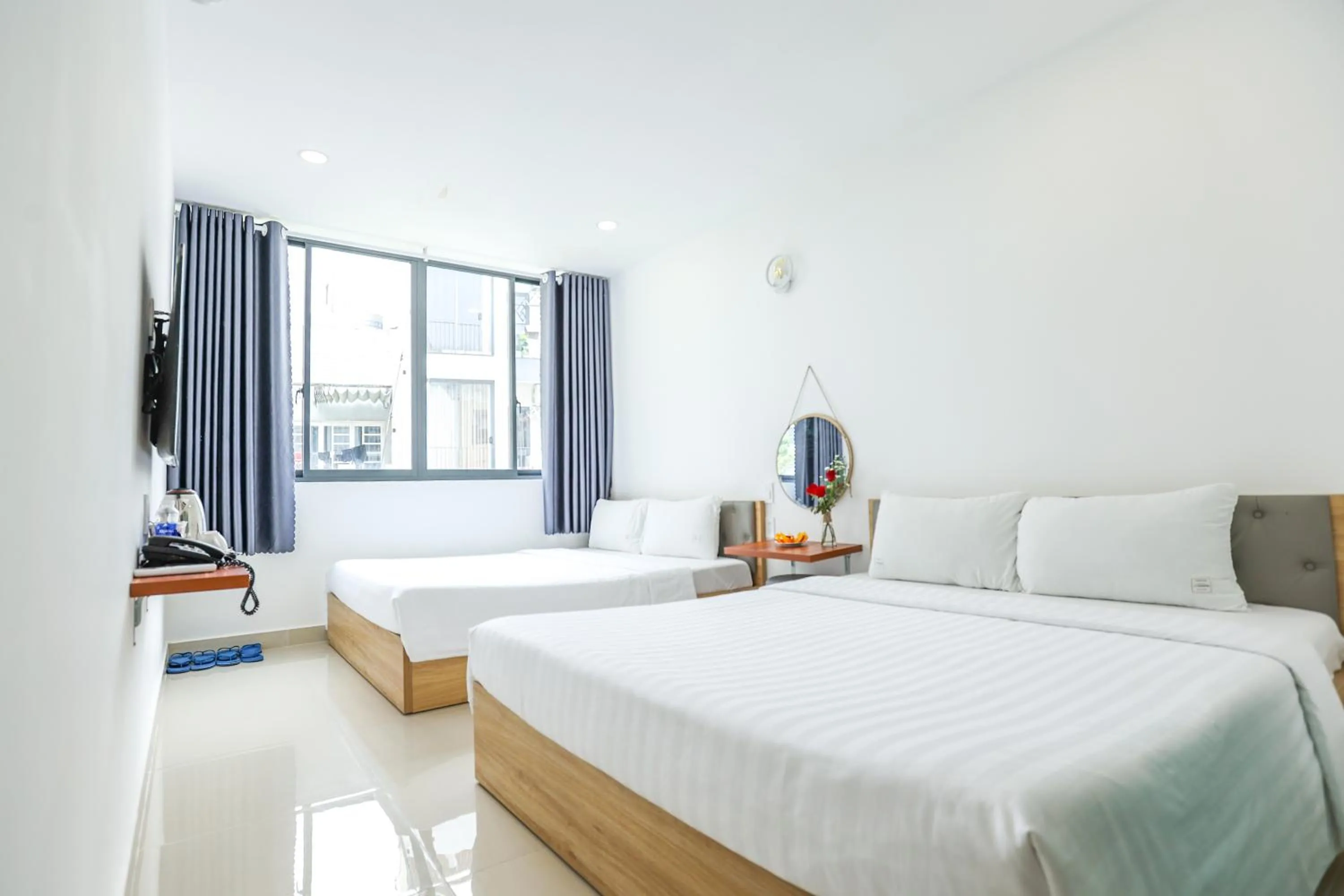 Bed in TalaSaiGon Hotel