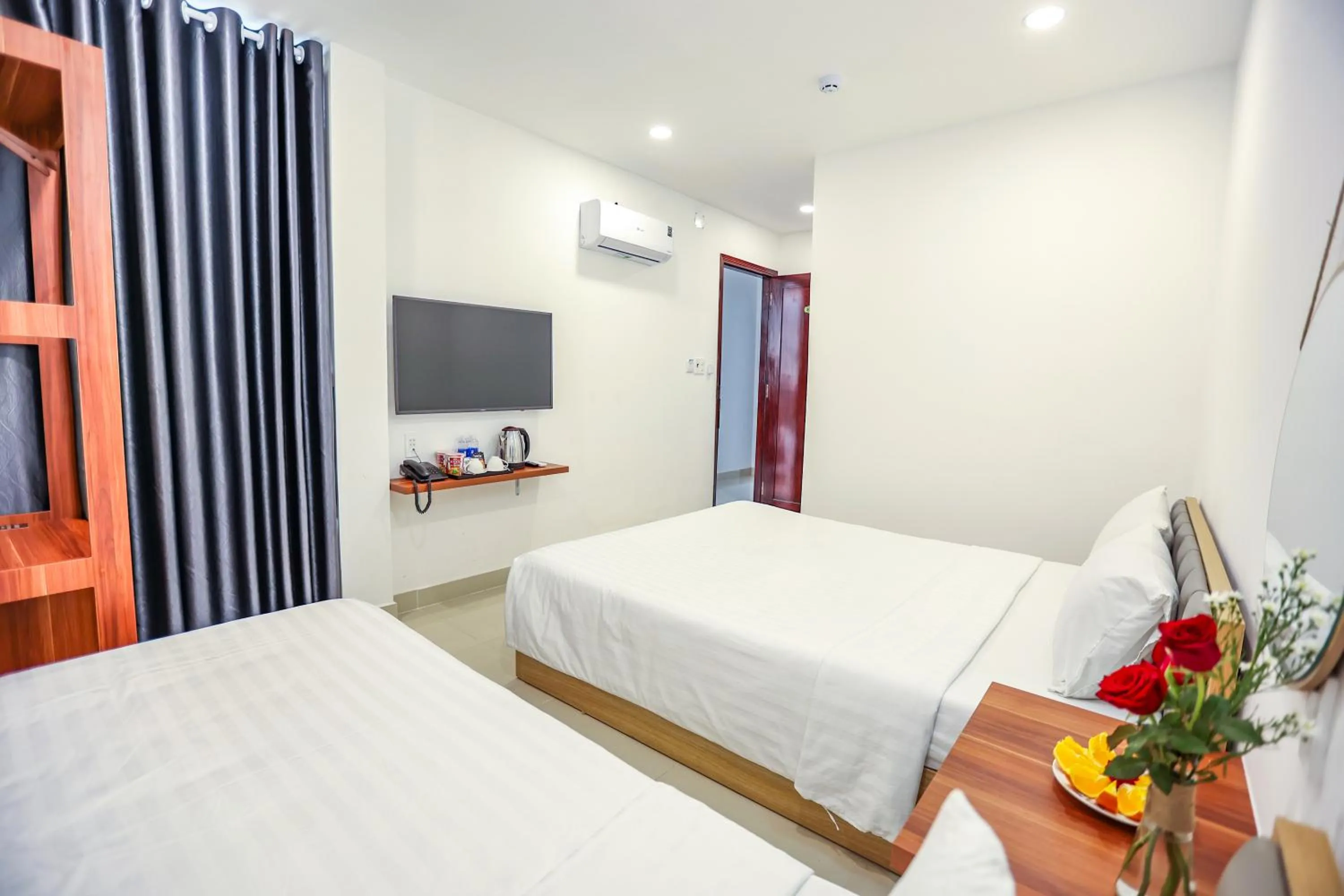Bed in TalaSaiGon Hotel