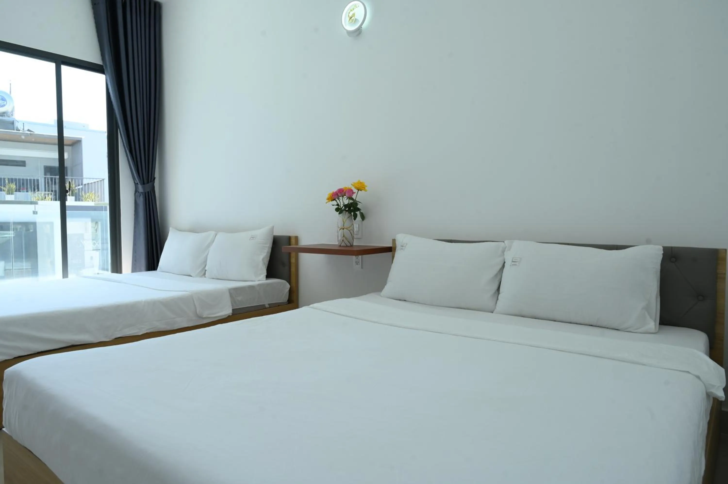Bed in TalaSaiGon Hotel