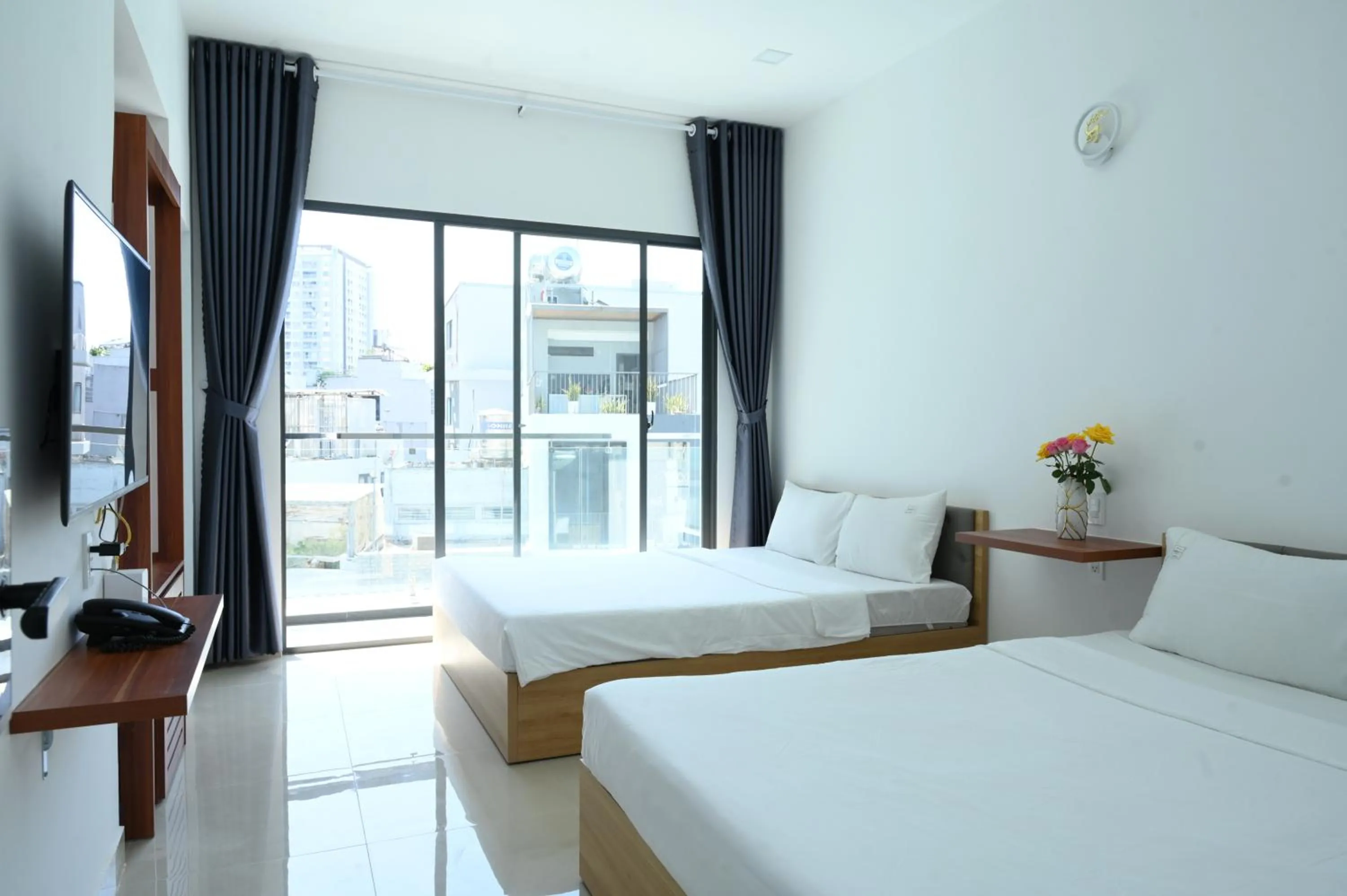 Bed in TalaSaiGon Hotel
