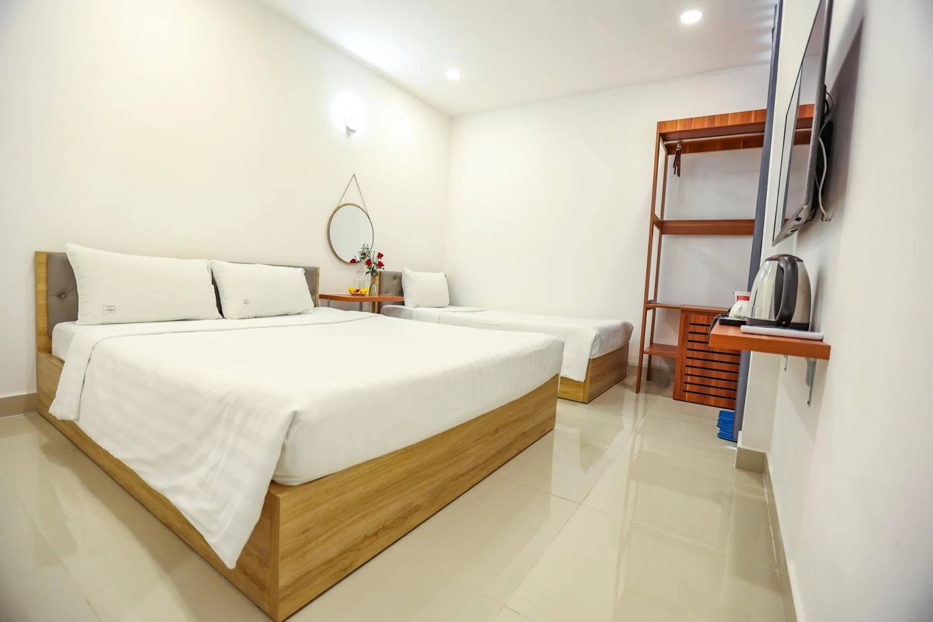 TV and multimedia, Bed in TalaSaiGon Hotel