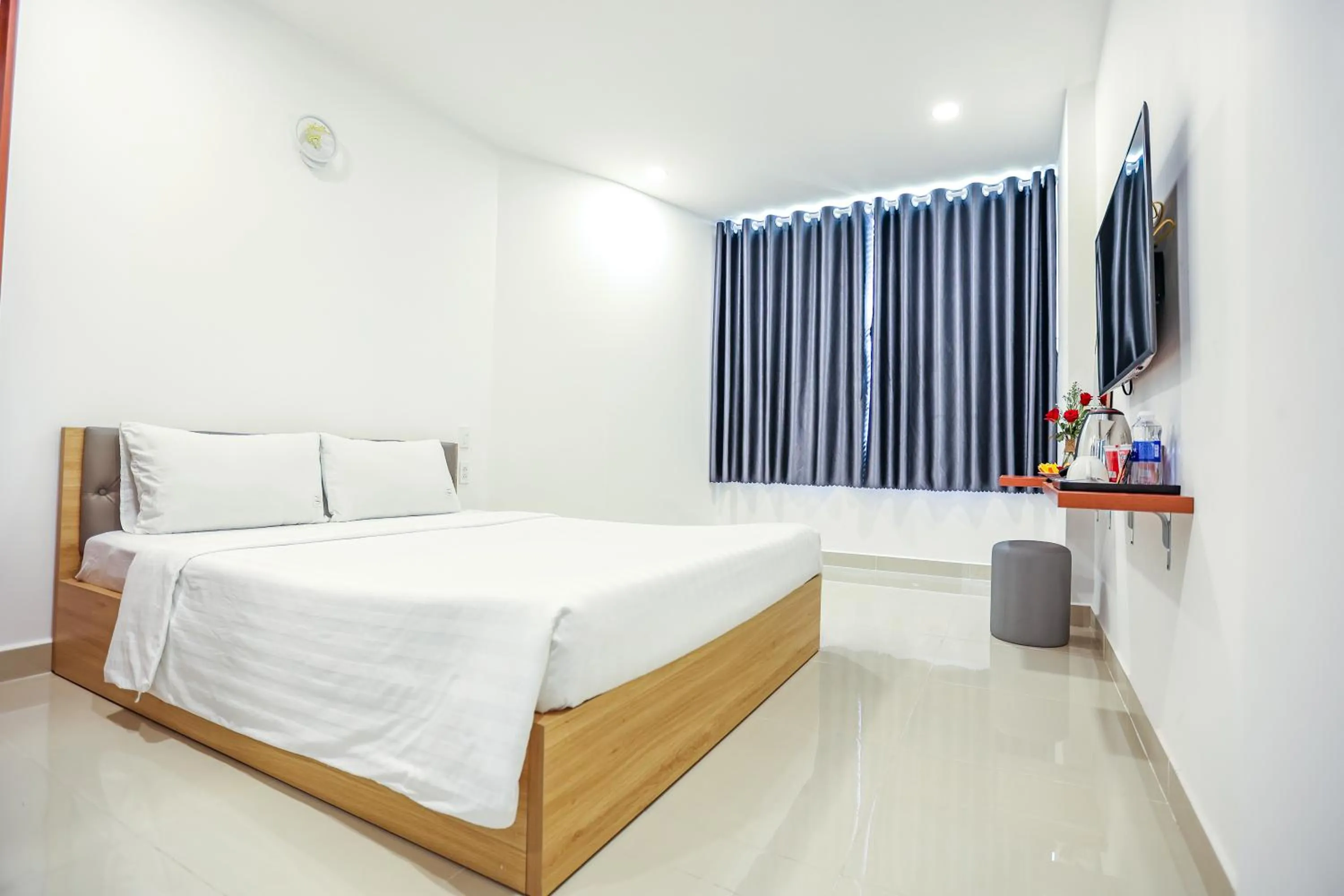 Bed in TalaSaiGon Hotel
