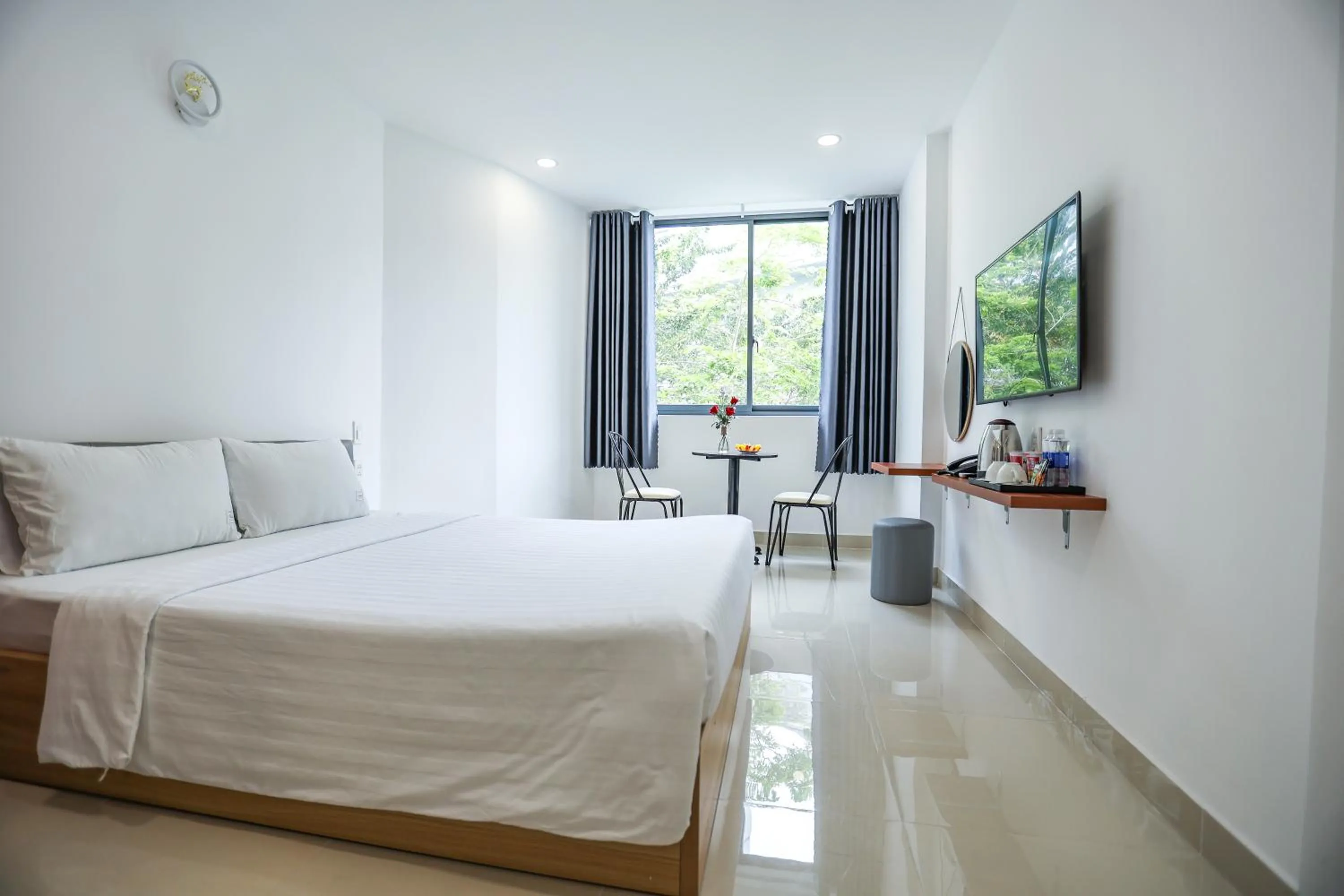 Bed in TalaSaiGon Hotel