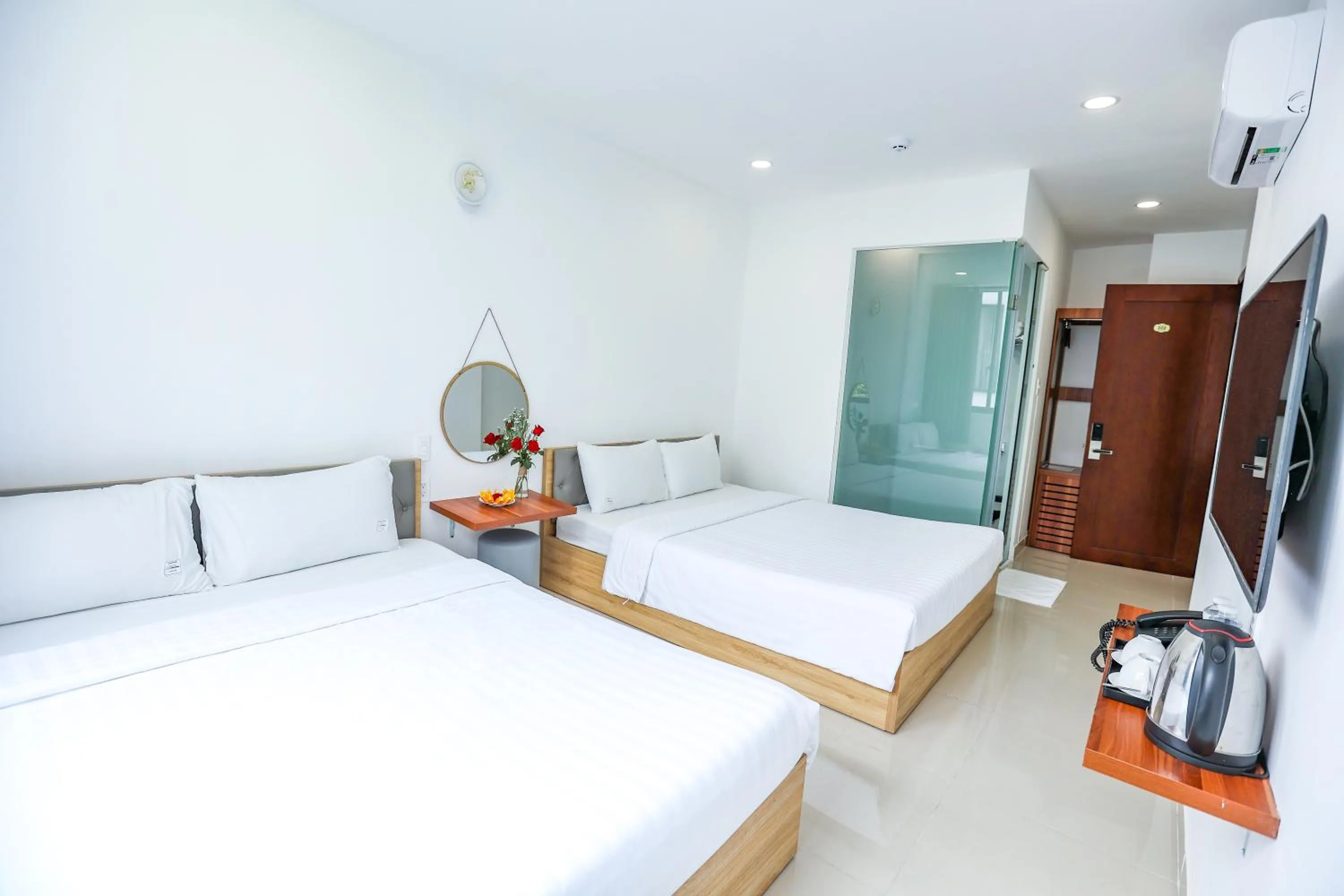 Bed in TalaSaiGon Hotel