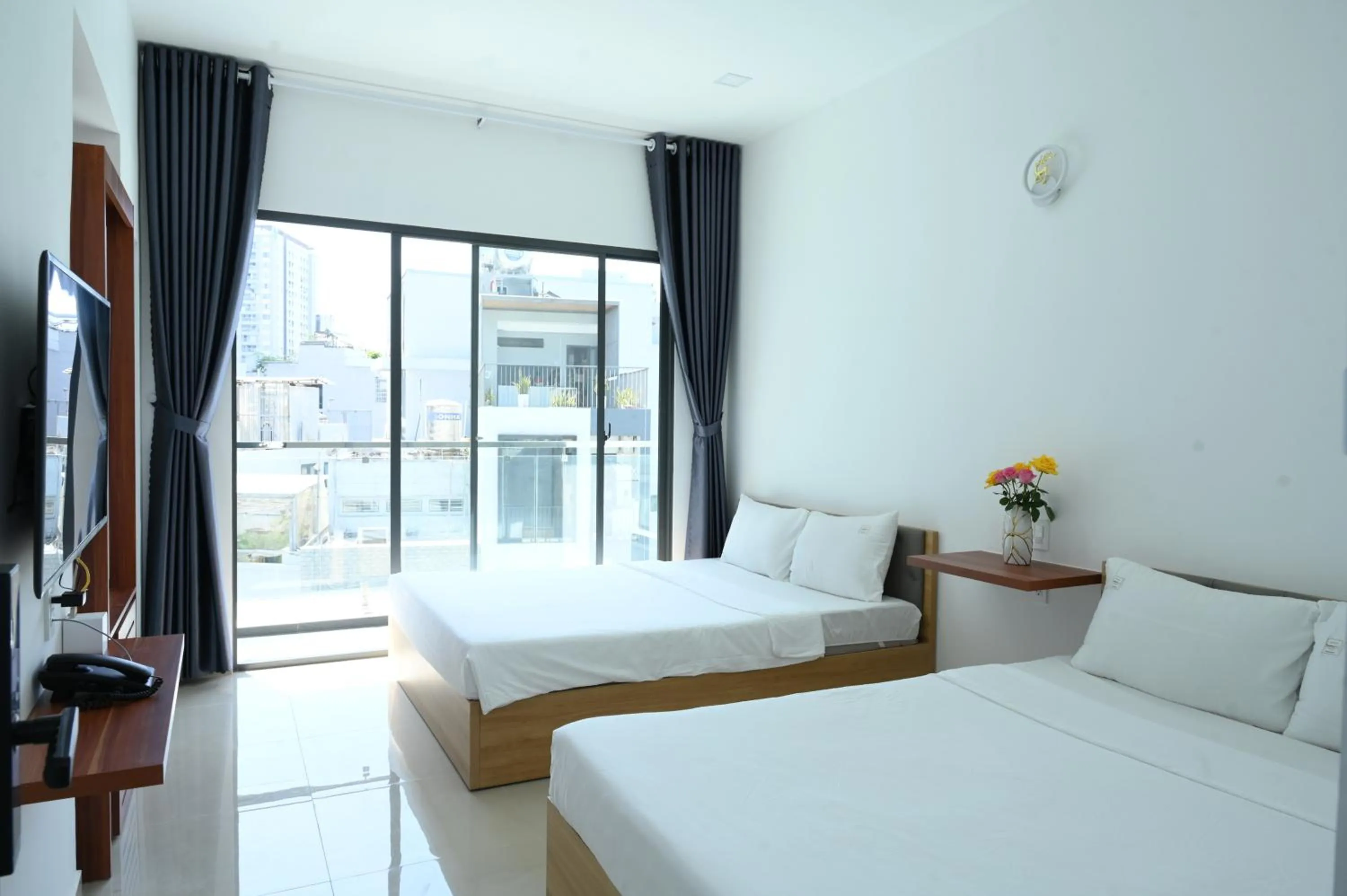 Bed in TalaSaiGon Hotel