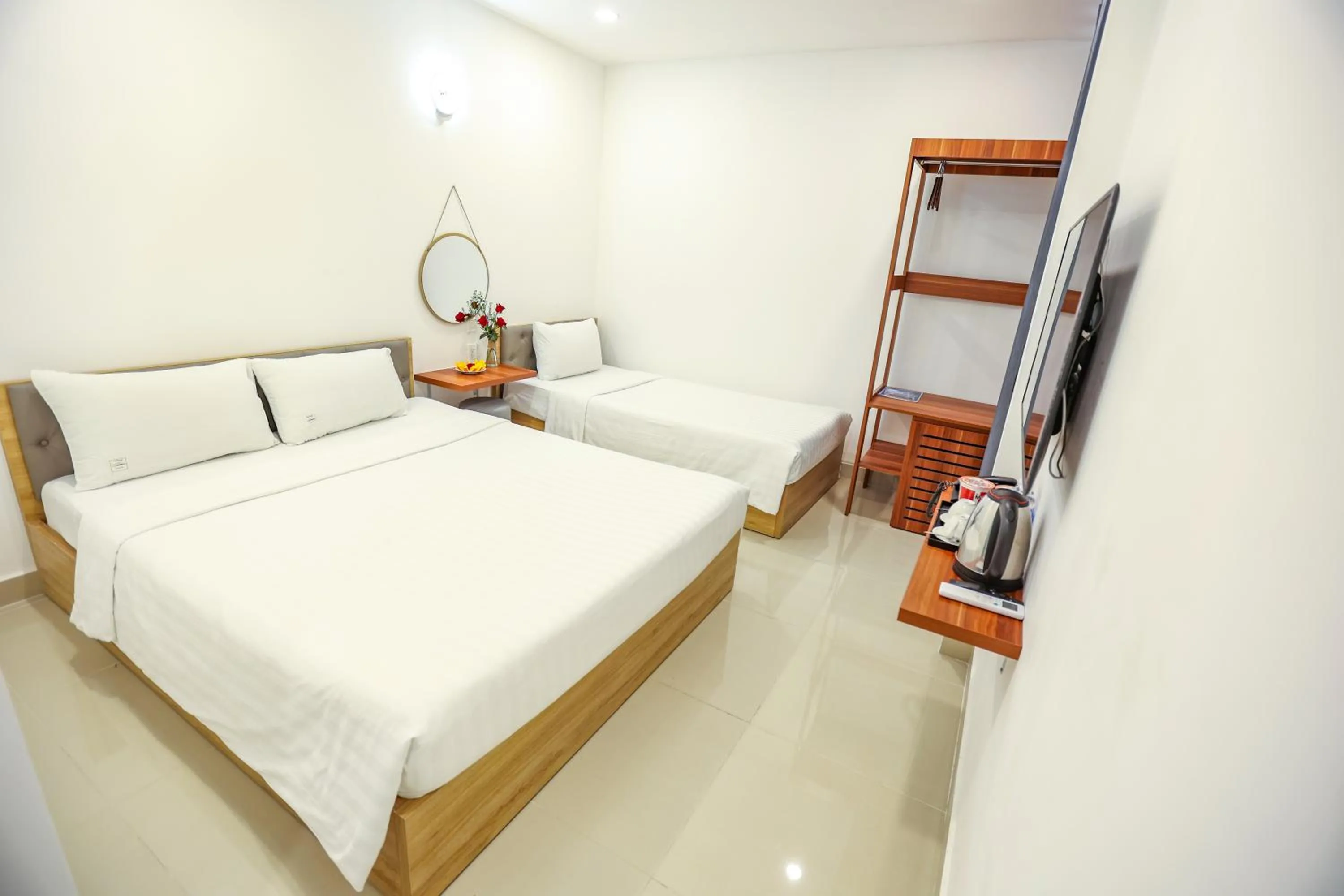 Bed in TalaSaiGon Hotel
