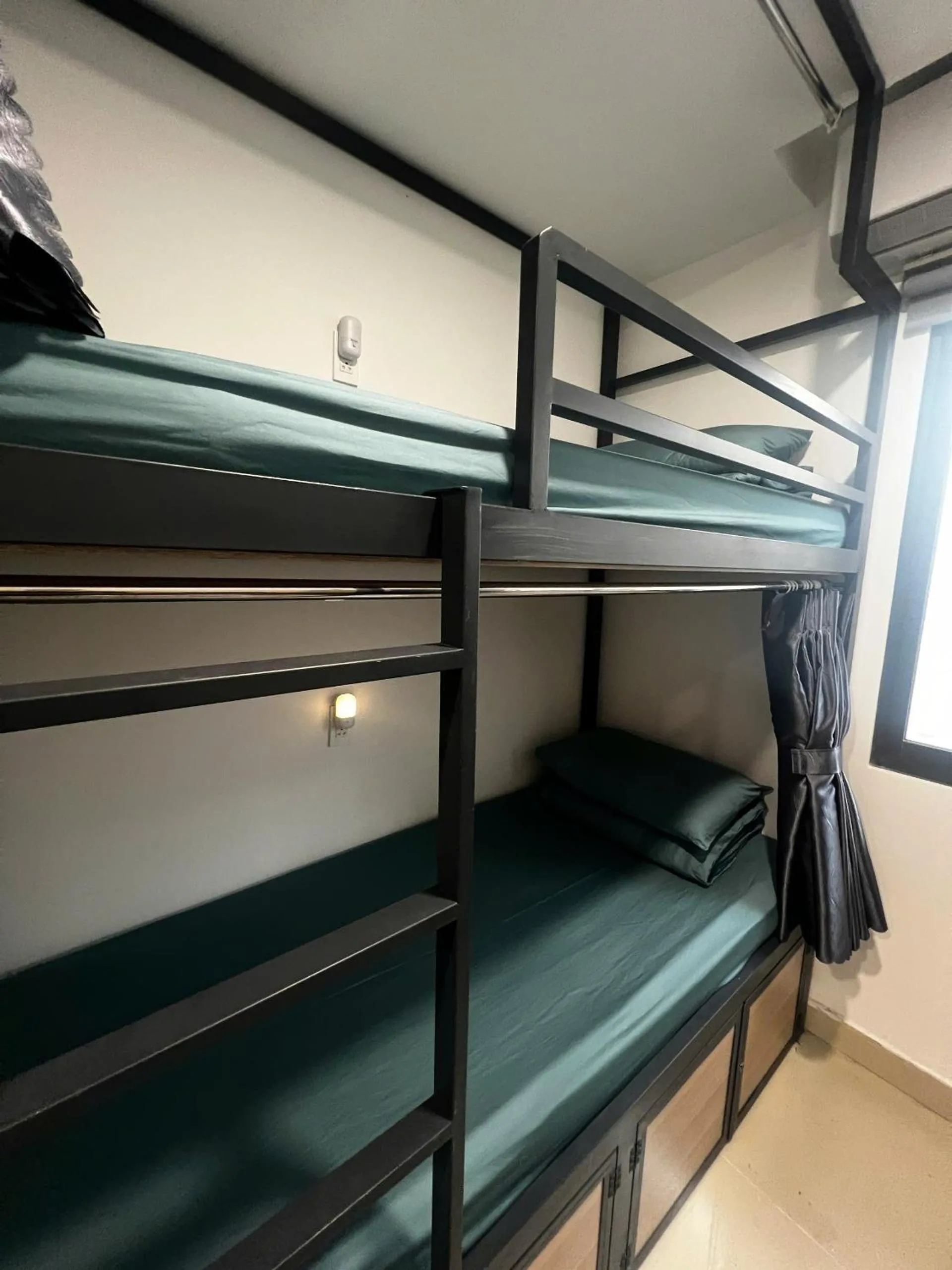 Bed in TalaSaiGon Hotel