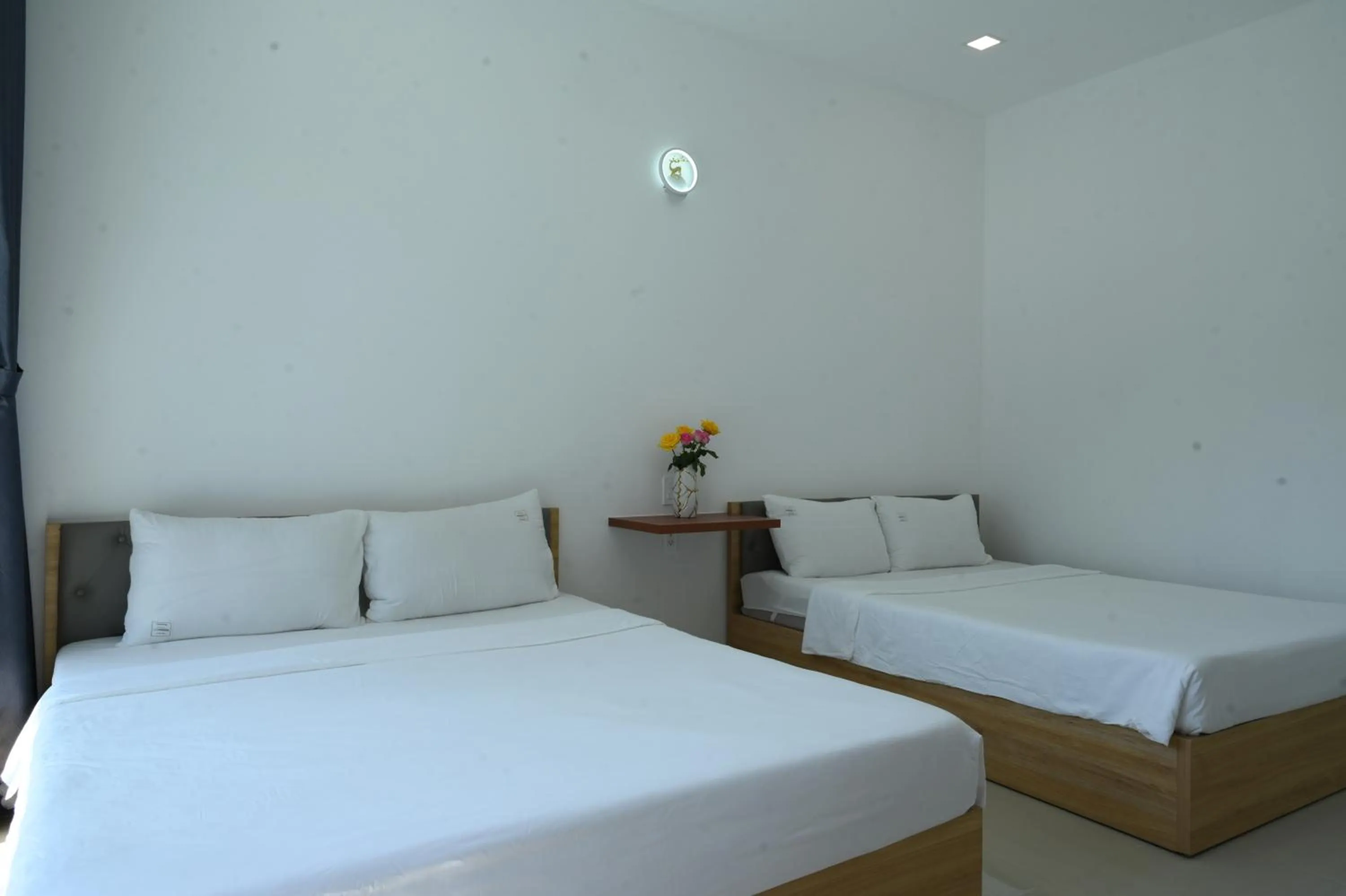 Bed in TalaSaiGon Hotel